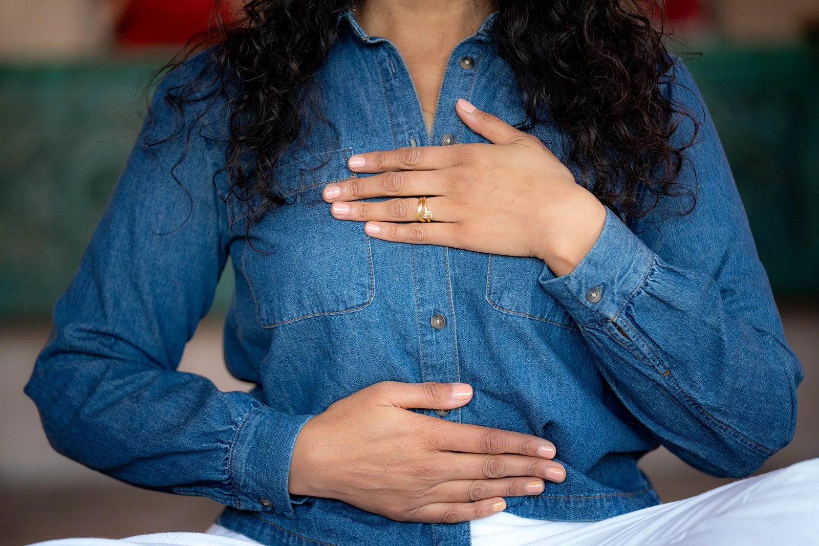 Dr. Rina Kansagra Fisher practicing Ayurvedic breathwork and heart-centered meditation for stress resilience.