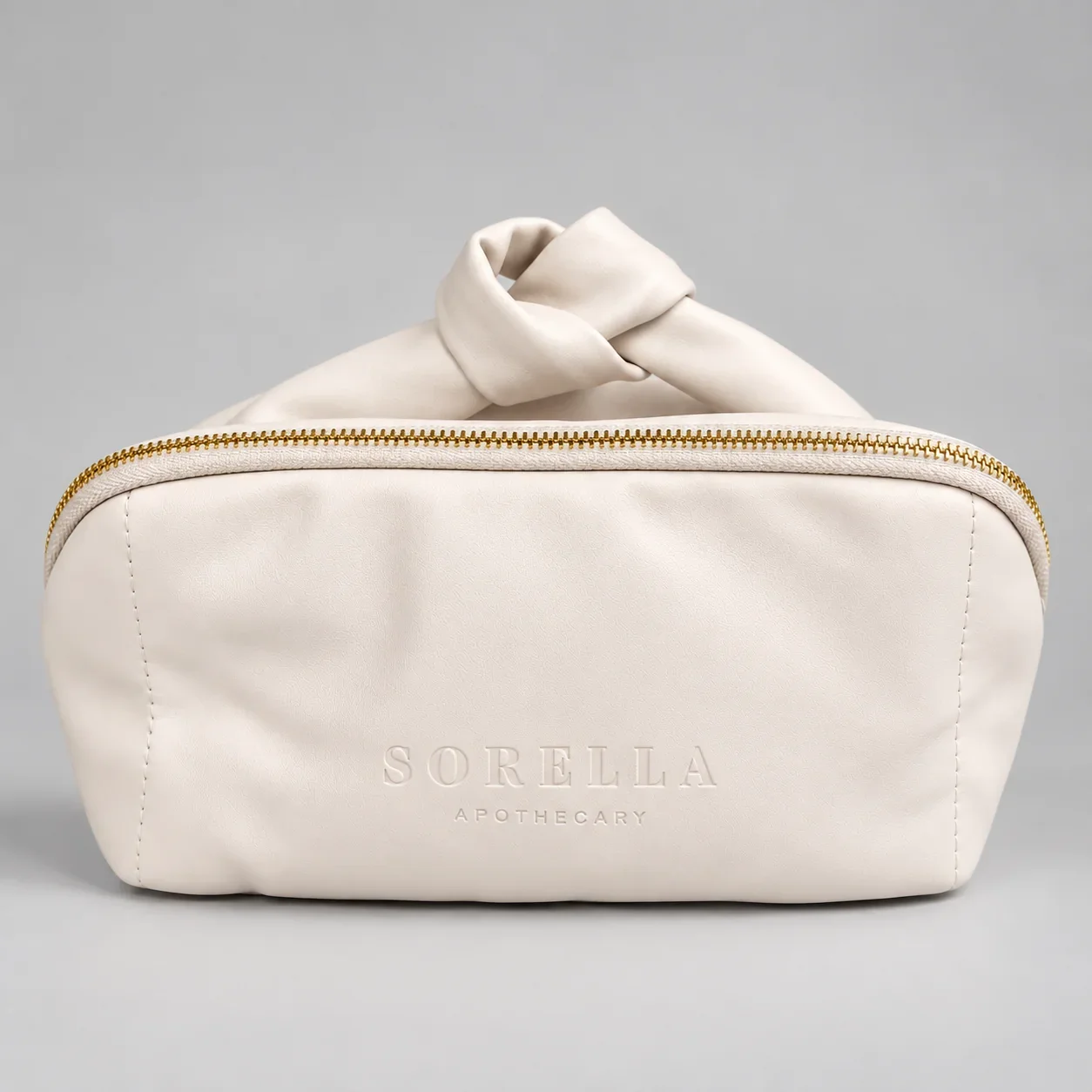 Ivory_Sorella_Knot-Handle_Pouch.webp