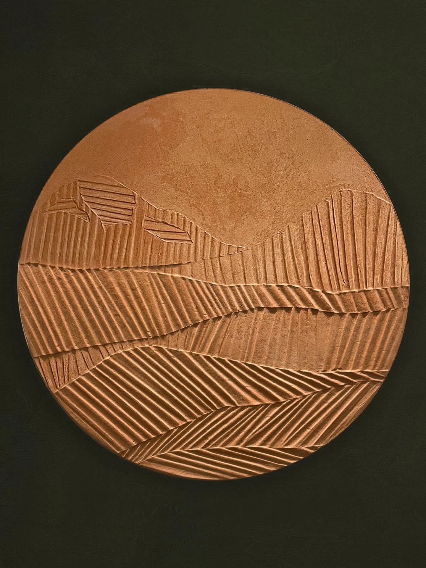 Finding a sense of grounding in the repetitive lines and warm, sun-baked tones of this circular landscape. Sometimes the most complex emotions are best expressed through simple, raw textures.

#textureart #mineralpaint #oscillations #bespokedesign #l