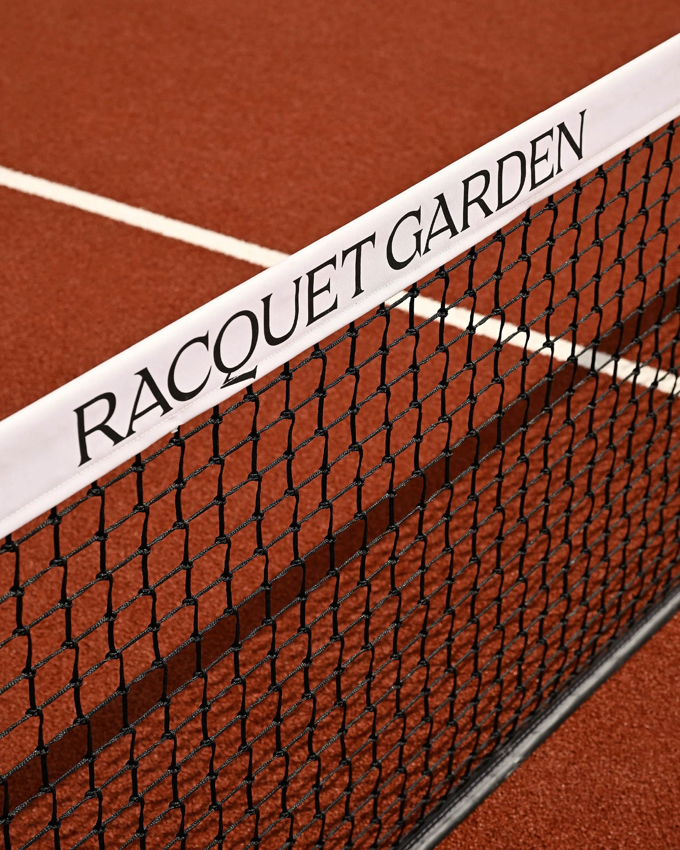 A countryside Racquet Club

Racquet Garden is a new sporting club nestled in the Wiltshire countryside, where outdoor padel courts, wood fired pizza, wellness and relaxed hospitality come together.
&nbsp;
Our brief was to create a brand inspired by t