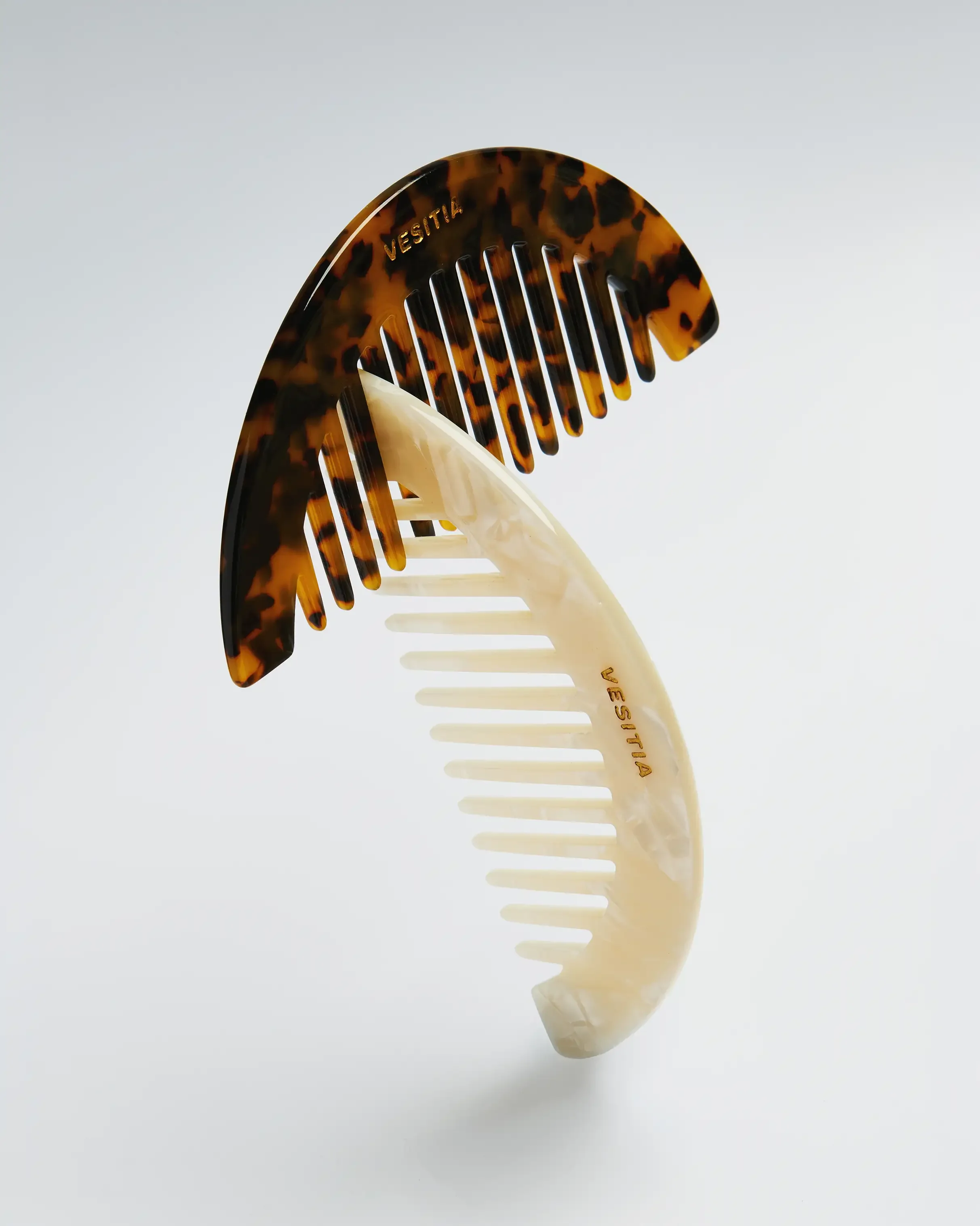 Crecient Combs Balance copy.webp