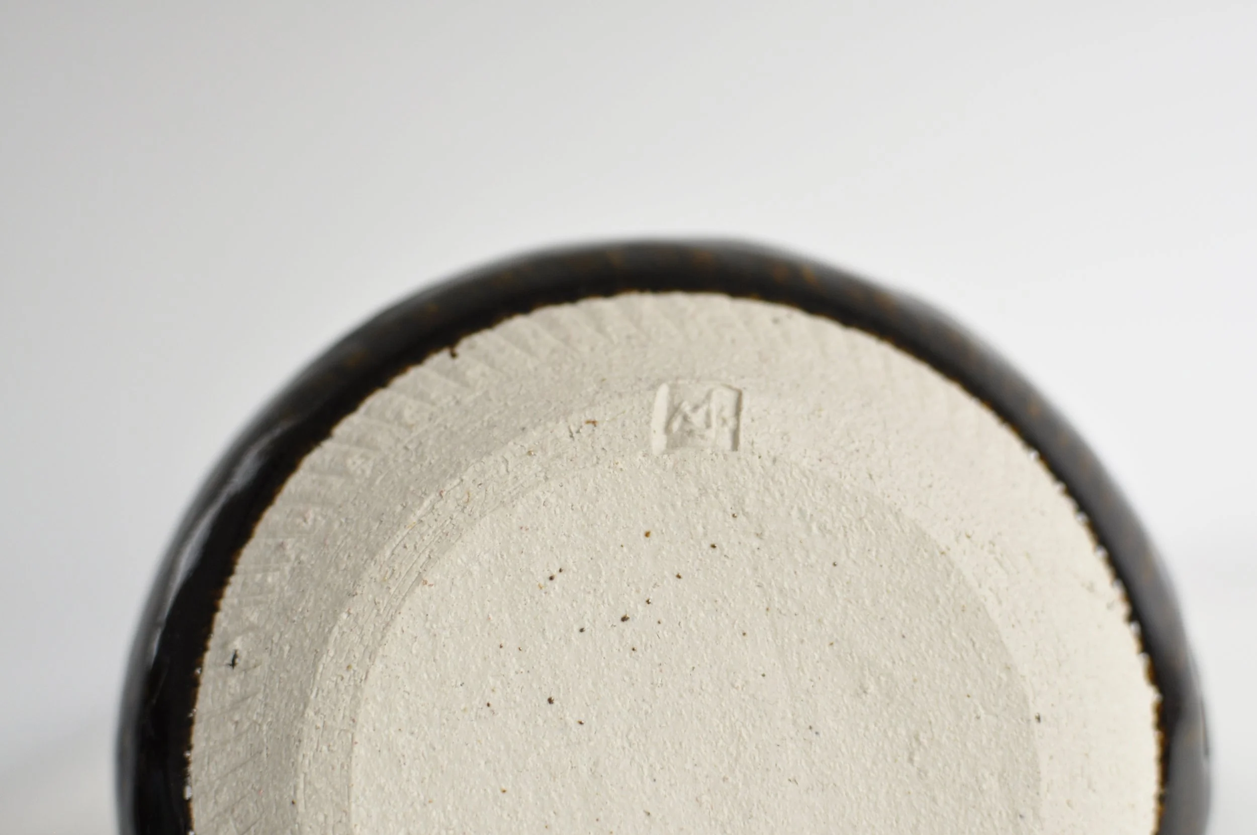 Mary J Boardman studio pottery mark on the base of a 1980s vase.