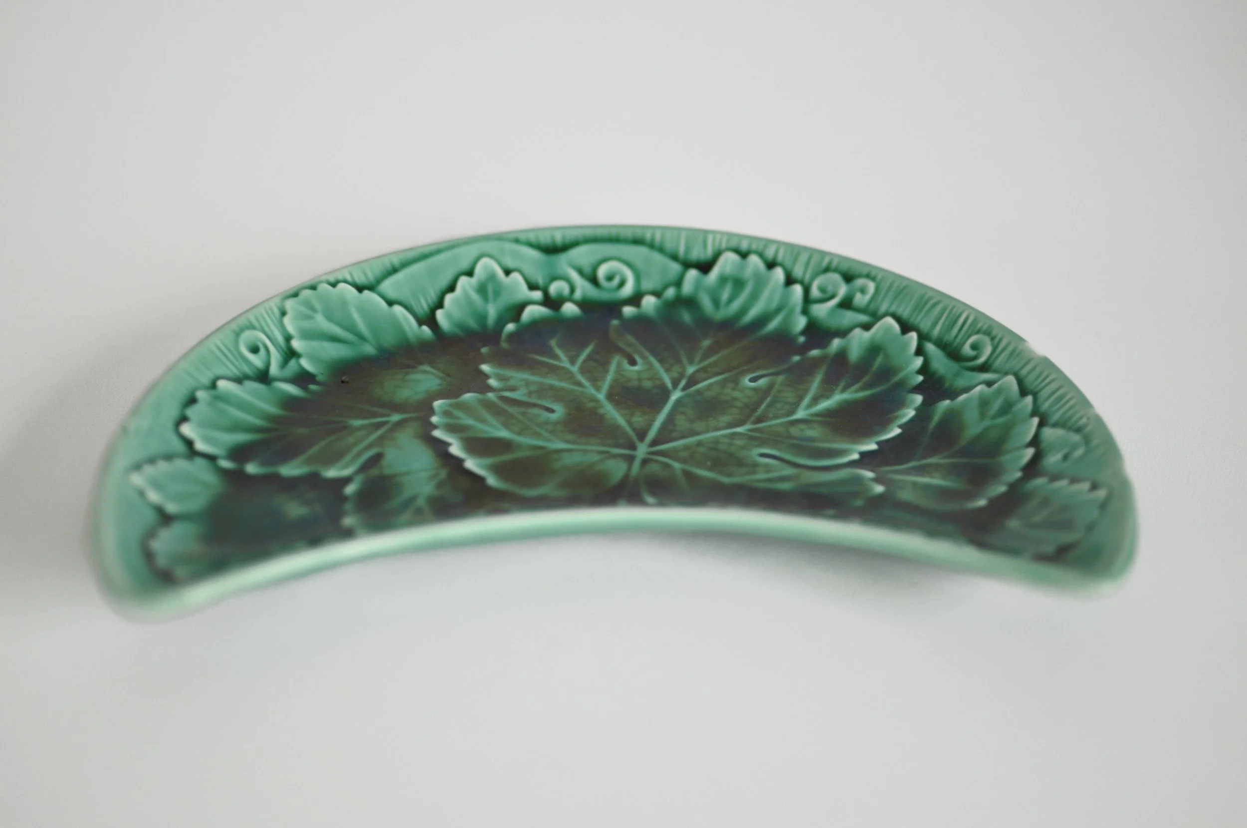 Crescent shaped green cabbage salad plate for Hollywood Regency styling.