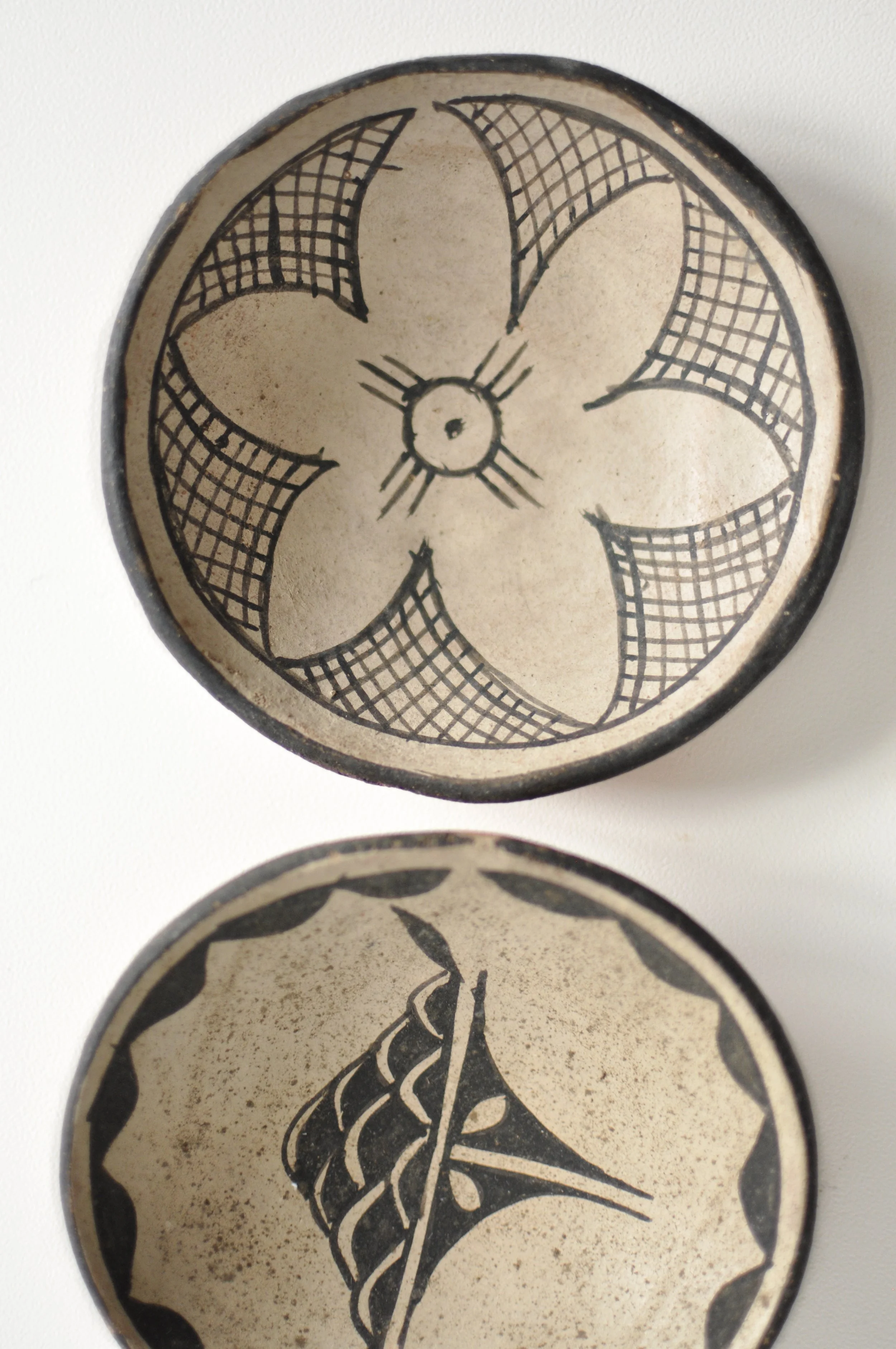 Close up of Cochiti spirit break detail in hand-painted pottery.