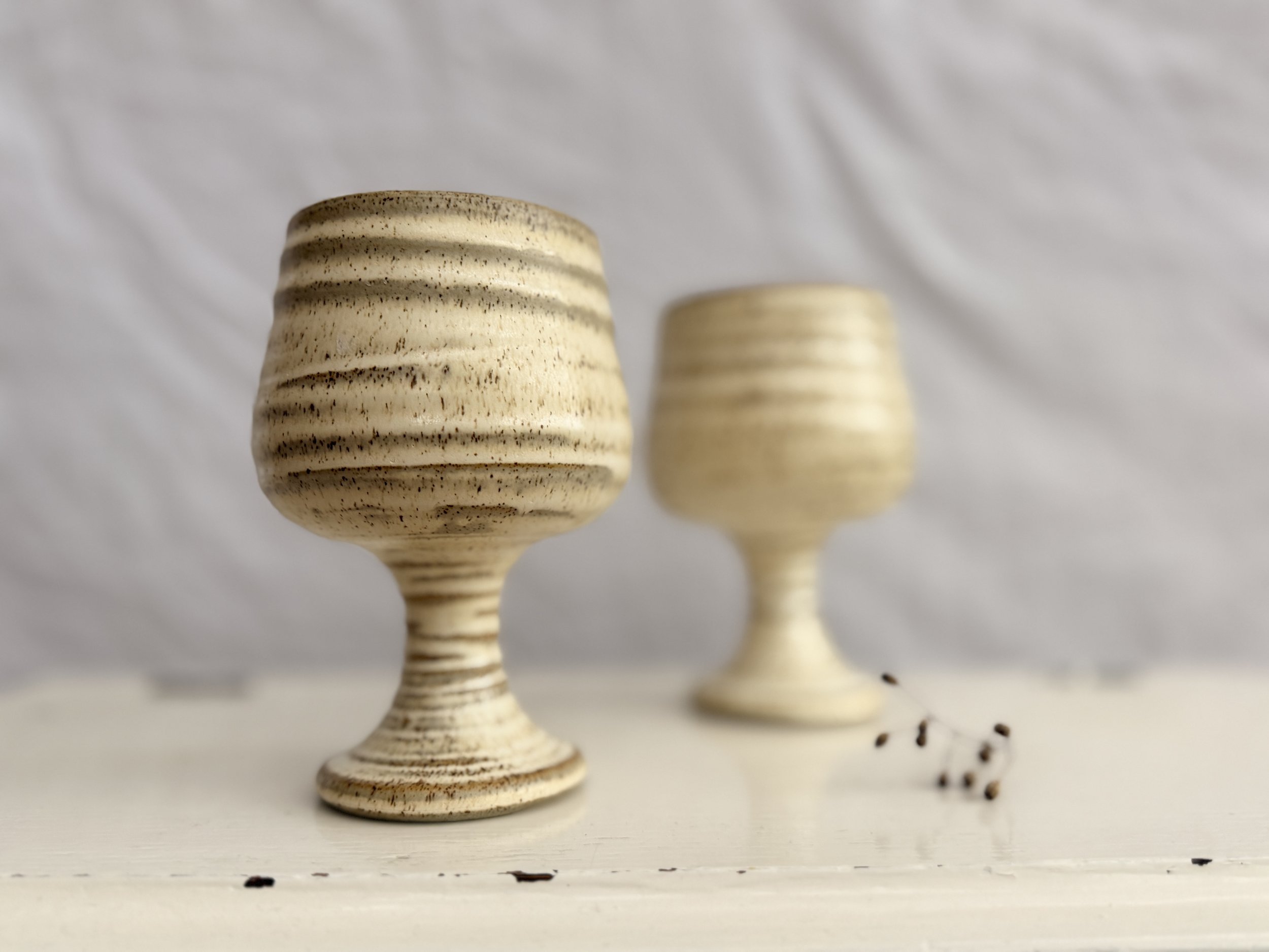 Side profile of the goblet showing the elegant yet chunky medieval-inspired shape.