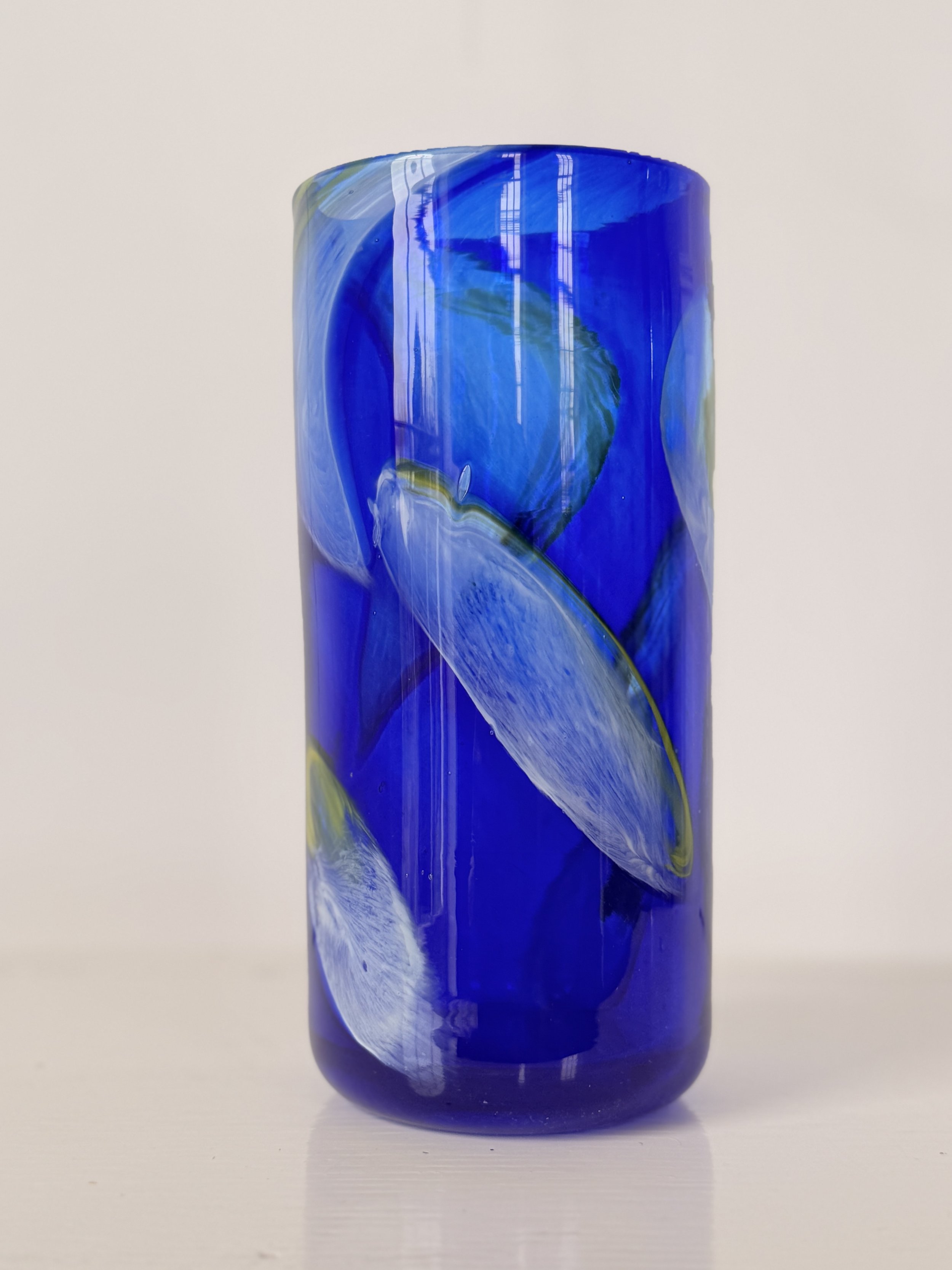 bright cobalt vase with feathered patterns