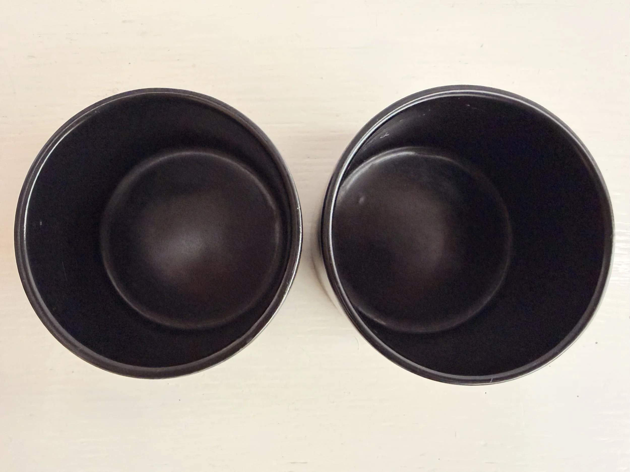 Looking inside the clean, black glazed interior of the Portmeirion sugar bowl.
