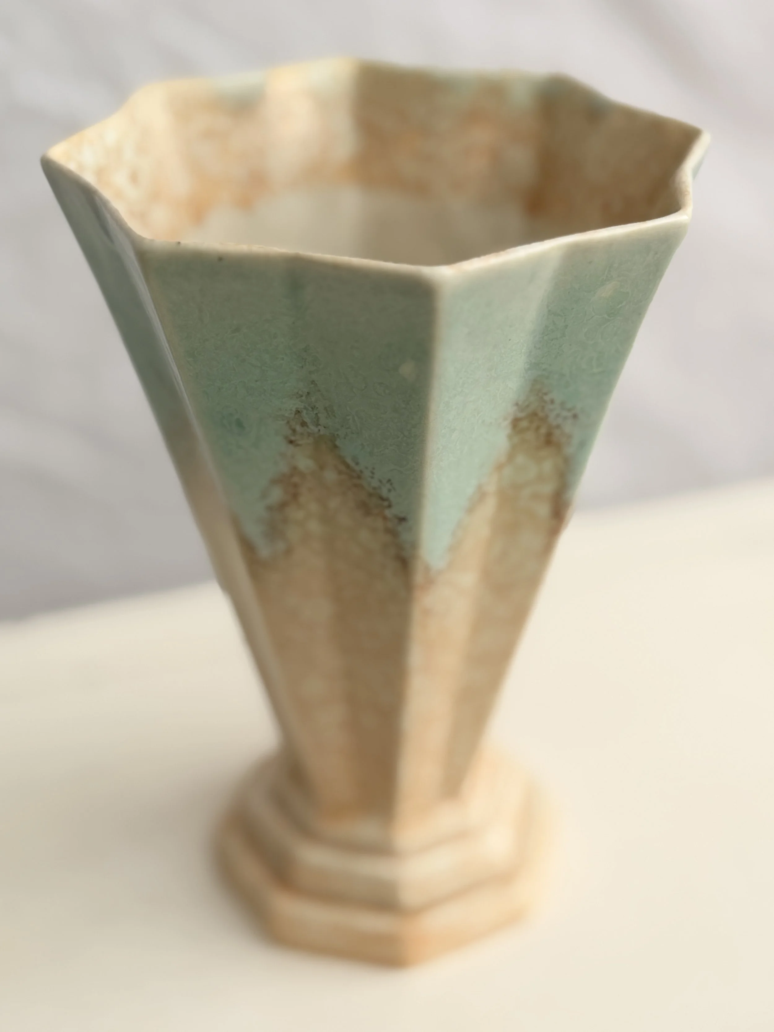 Detail shot of the hand-finished glaze on a vintage English studio pottery vase.