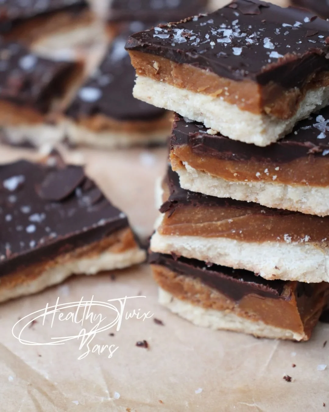 Healthy Twix Bars 💘💘💘💘

Shortbread Layer 
1/2 cup coconut flour
1/2 cup almond flour
1/3 cup coconut oil, melted 
3 tbsp maple syrup 

Caramel Layer 
1/2 cup almond butter 
1/4 cup coconut oil
1 tsp vanilla extract
1/4 cup maple syrup 
Pinch of s