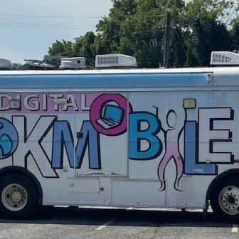 The Bookmobile it HERE!! How many of you remember the Bookmobile from your childhood? ✋What a treat! 📚The kids took turns going inside the cool bus with laptops and all kinds of books! Thank you! @Chattahoochee Valley Libraries @themilldistrictinc @