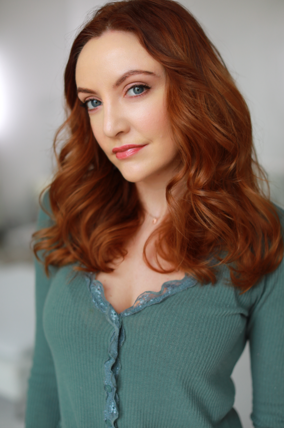 Sarah Street Head Shot Green V Neck.png