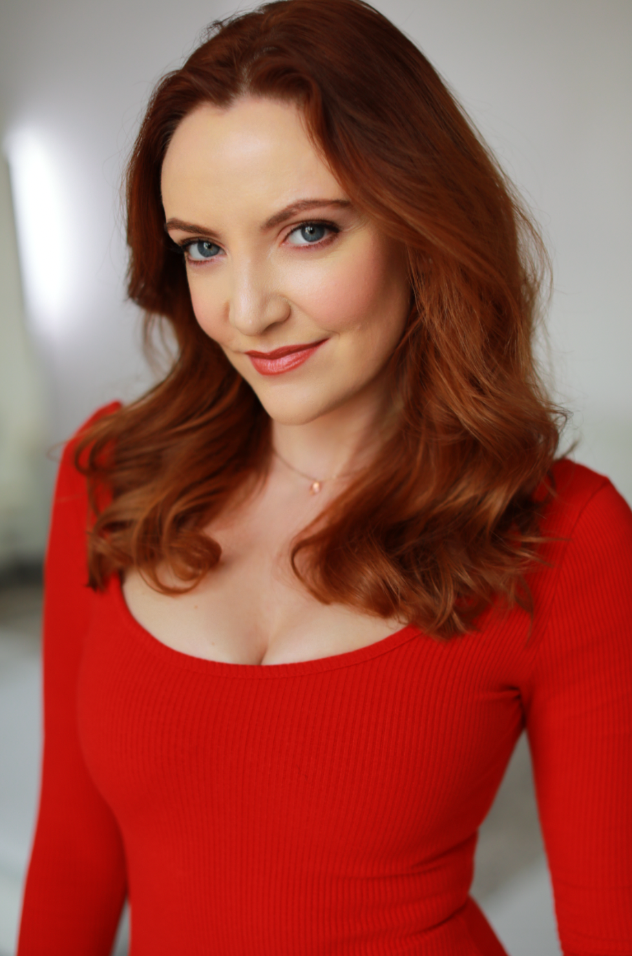 Sarah Street Head Shot red long.png