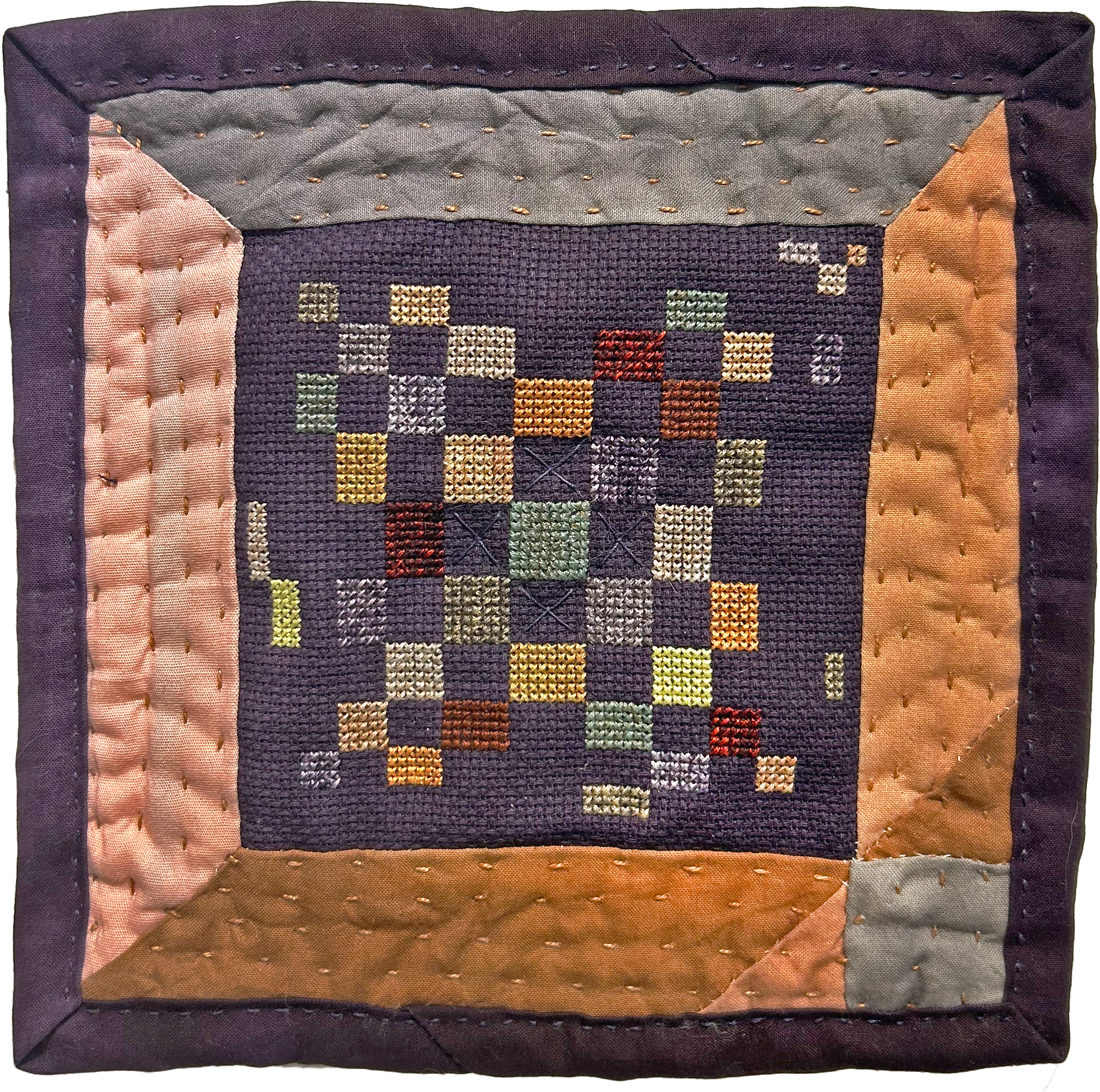 Token (The one with the cross stitch)