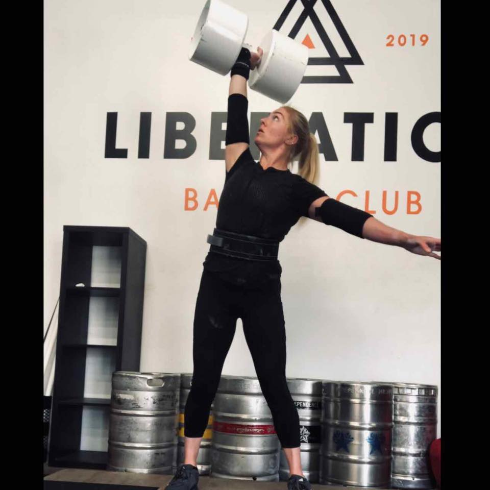 Woman With Dumbell Overhead
