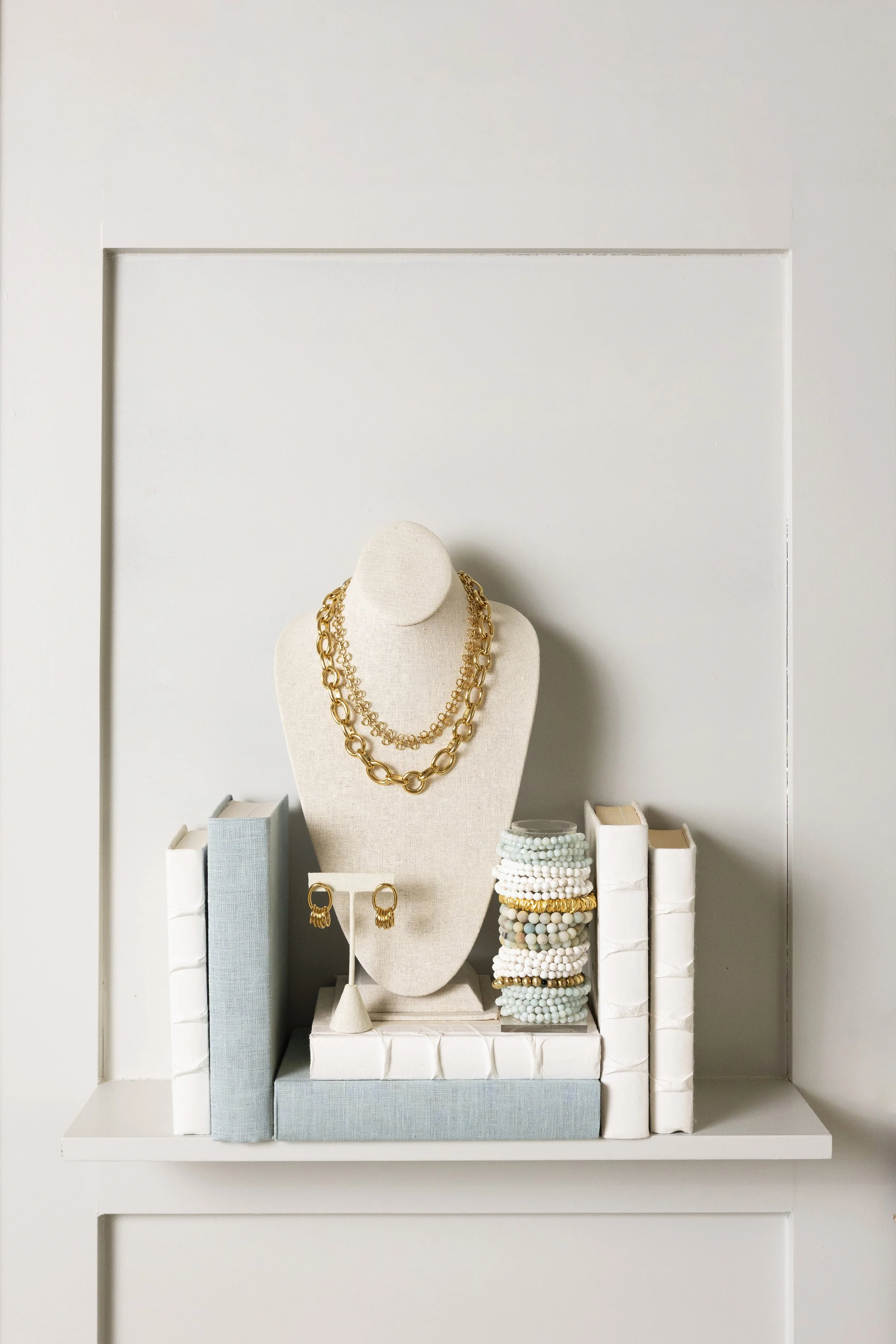 jewelry linen books stacked bracelets