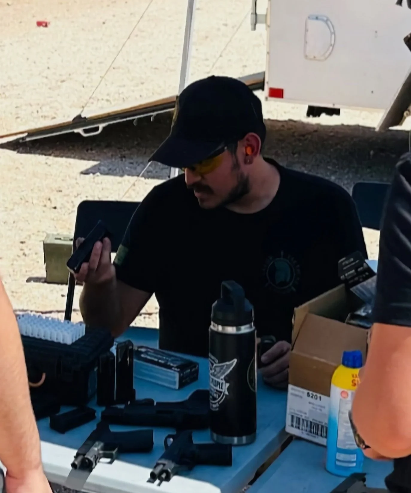 Me refilling magazines.jpg