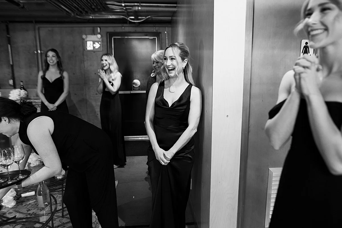 bridesmaids see the bride finished for her wedding day
