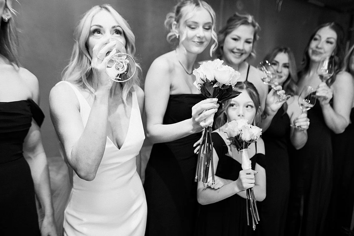 monte creek cheers champagne with bride and bridesmaids