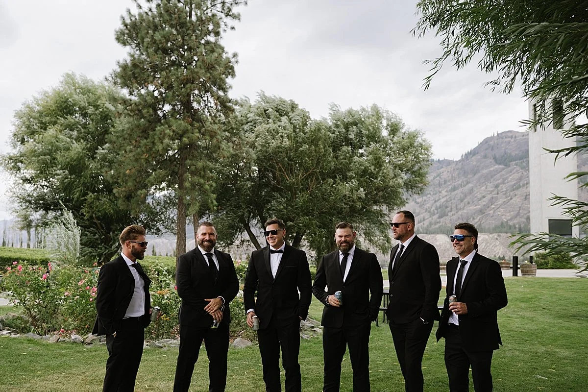 Groomsmen in front of Monte Creek Winery Venue