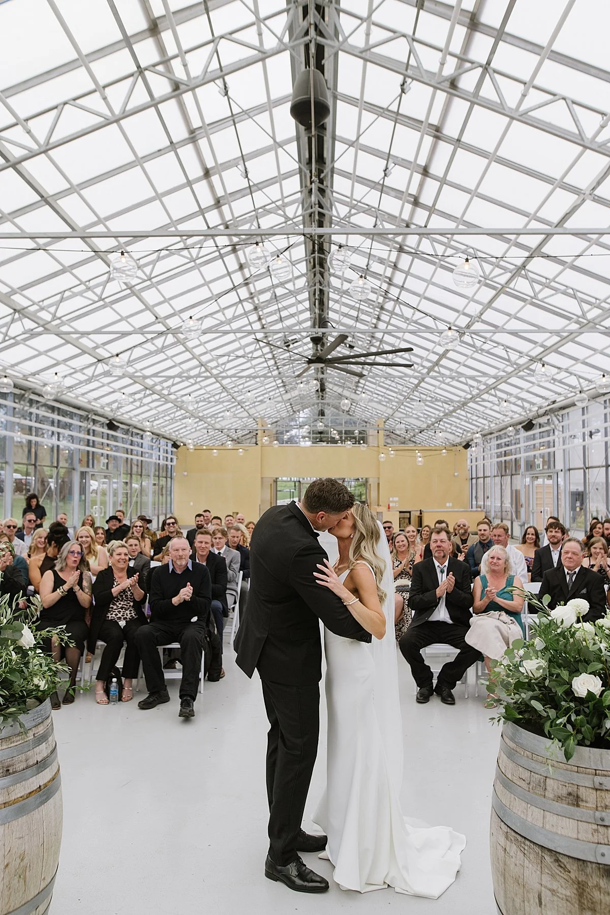 First kiss for bridge and groom at Monte Creek Winery Wedding Venue