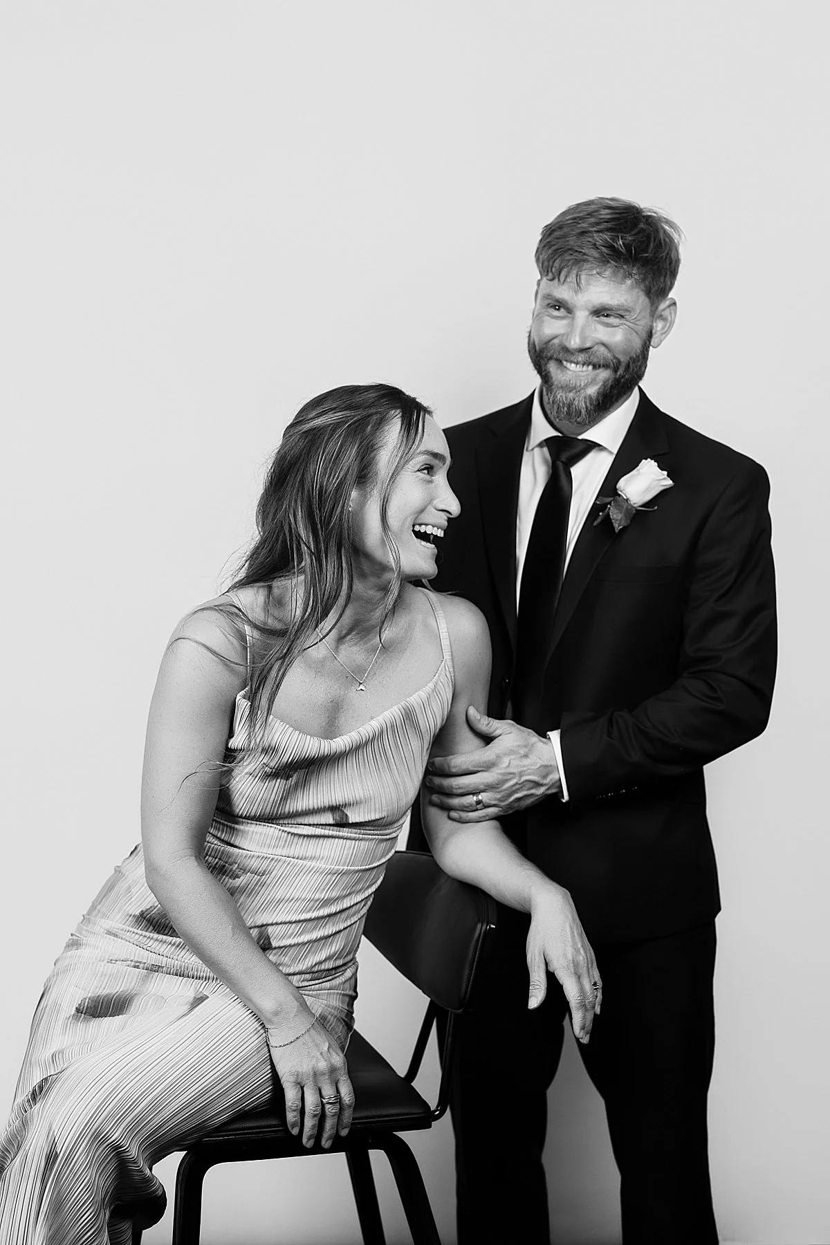 wedding guests laughing in Photo Booth at the delta hotel kamloops