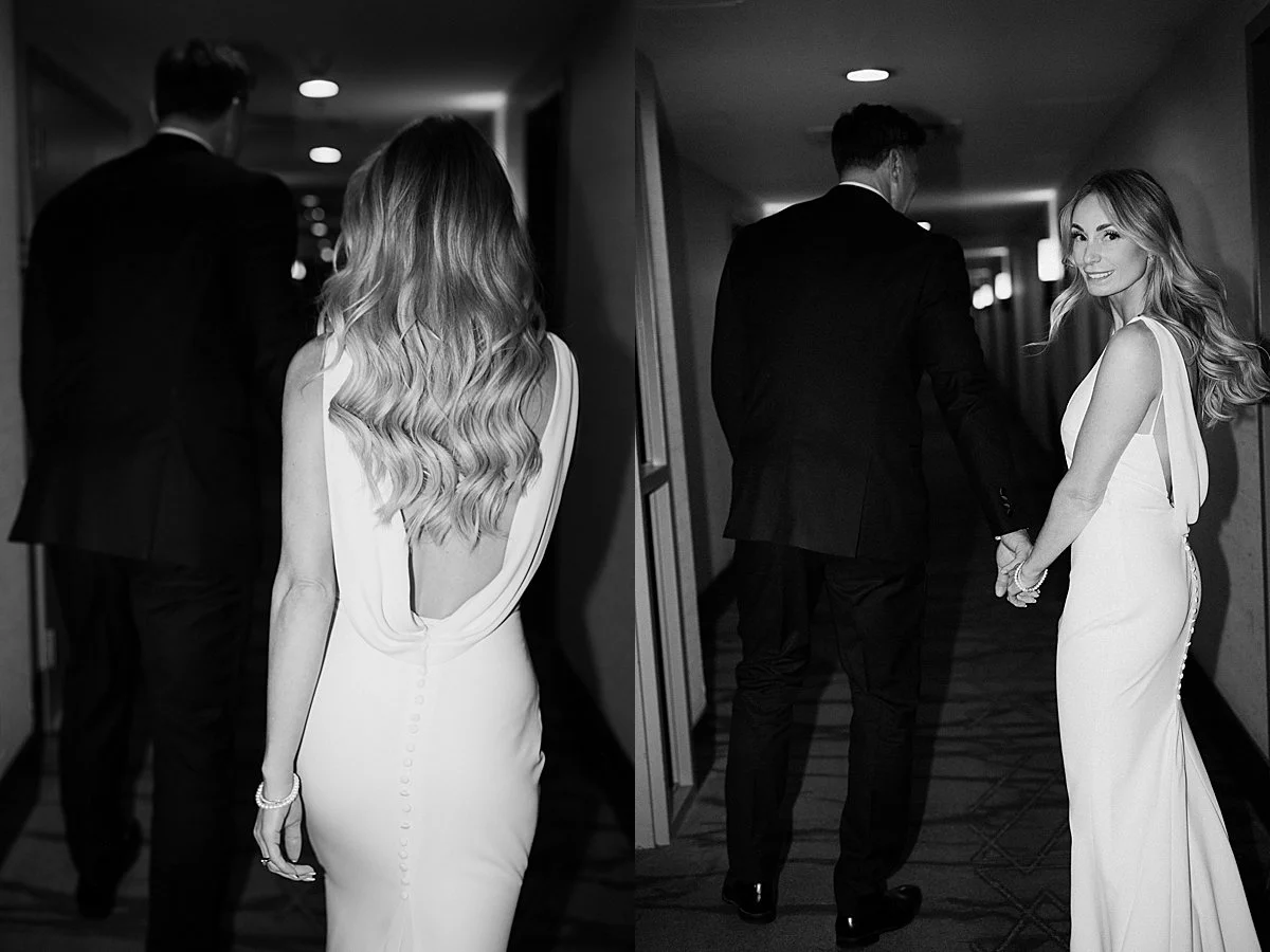 wedding couple sneaking off for intimate photos in hallway