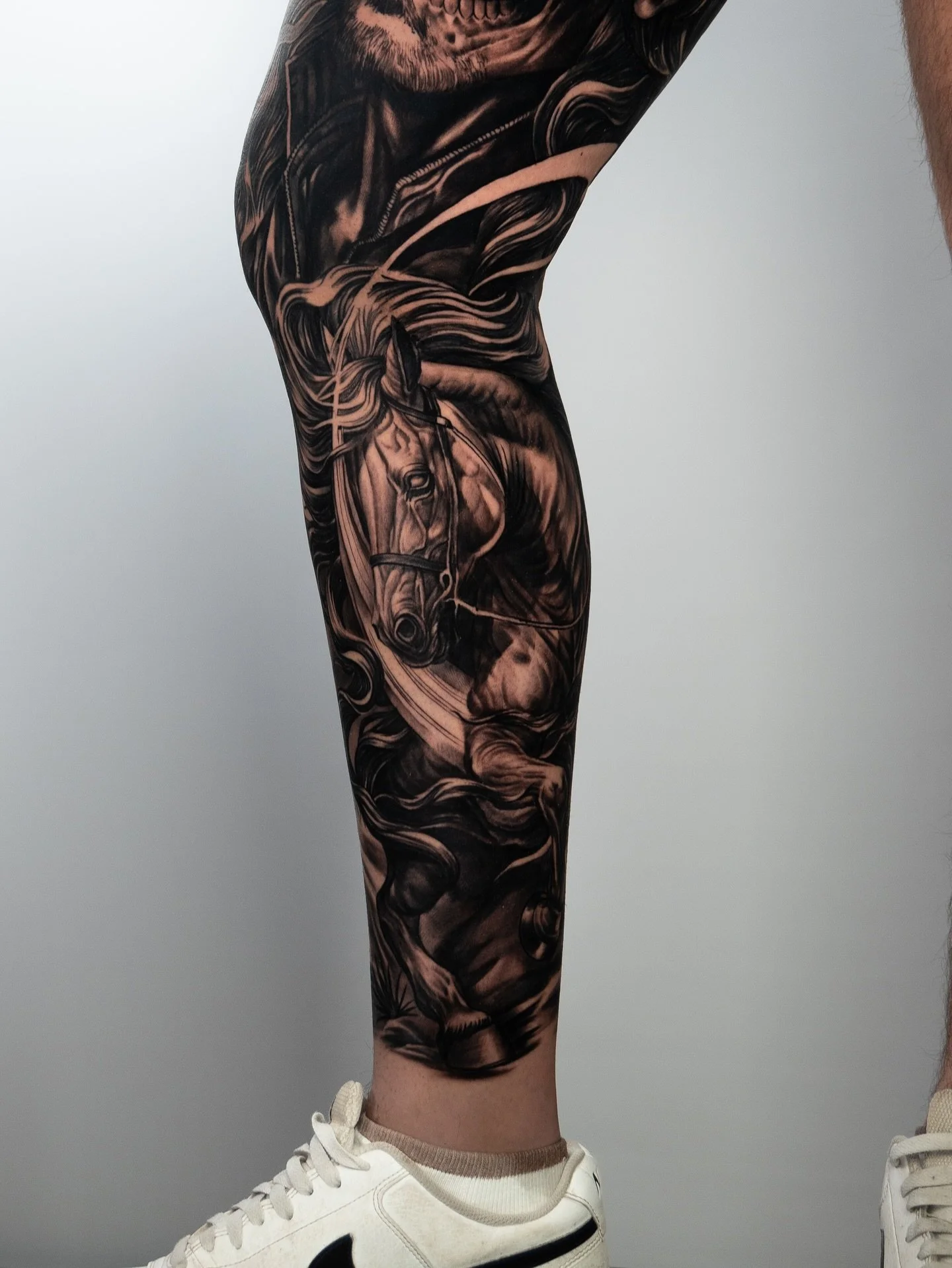What does it take to turn a single idea into a full leg sleeve?
 Time, trust, and an artist who understands your vision.

This Western leg sleeve started last year with the outer leg completed over three sessions. When our client came back to finish 
