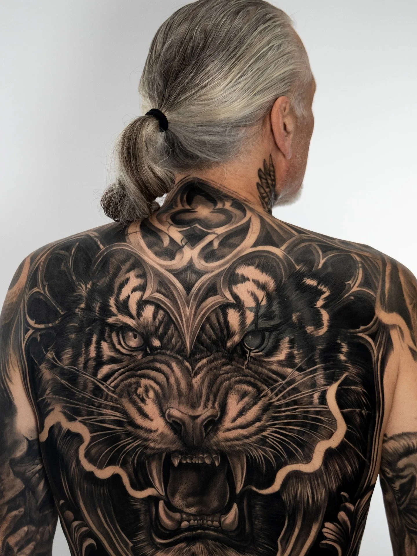 Can a full back tattoo still work if it&rsquo;s an extensive cover-up? 
Absolutely, when it&rsquo;s done with the right planning, experience, and trust.

Tyron came to us with a big challenge.
 Two bold, solid black tattoos sat on either side of his 