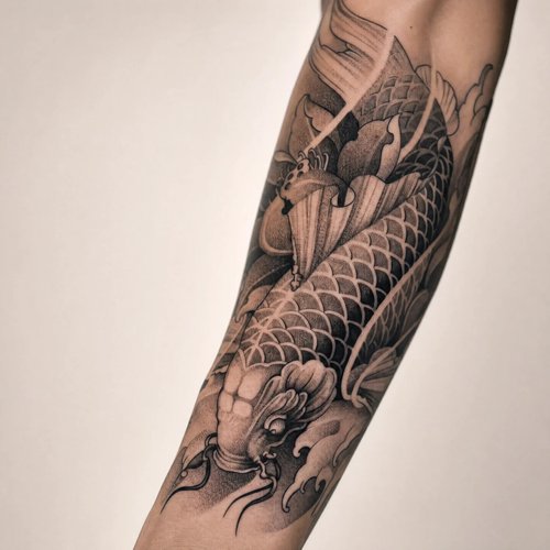 Black-and-grey koi fish tattoo