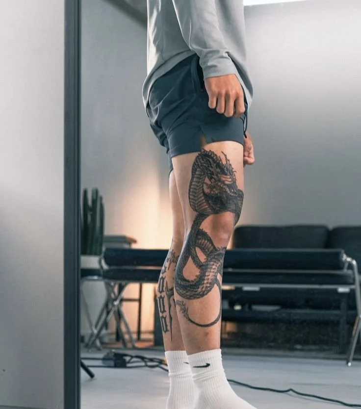 outer thigh tattoo placement for guys