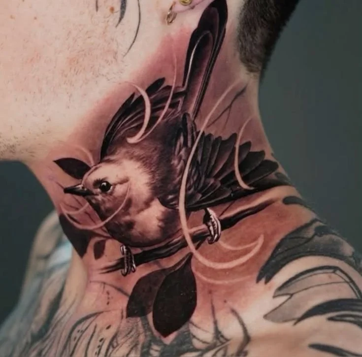 bold neck tattoos for men black and grey design flowing to jawline