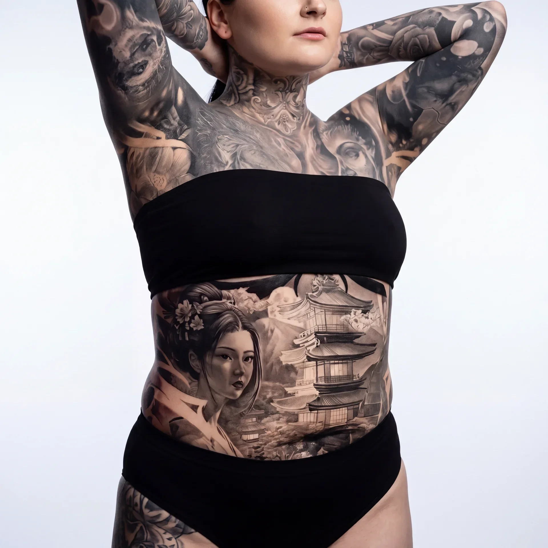 Close-up of floral black and grey realism sleeve and chest tattoos with a small neck butterfly.