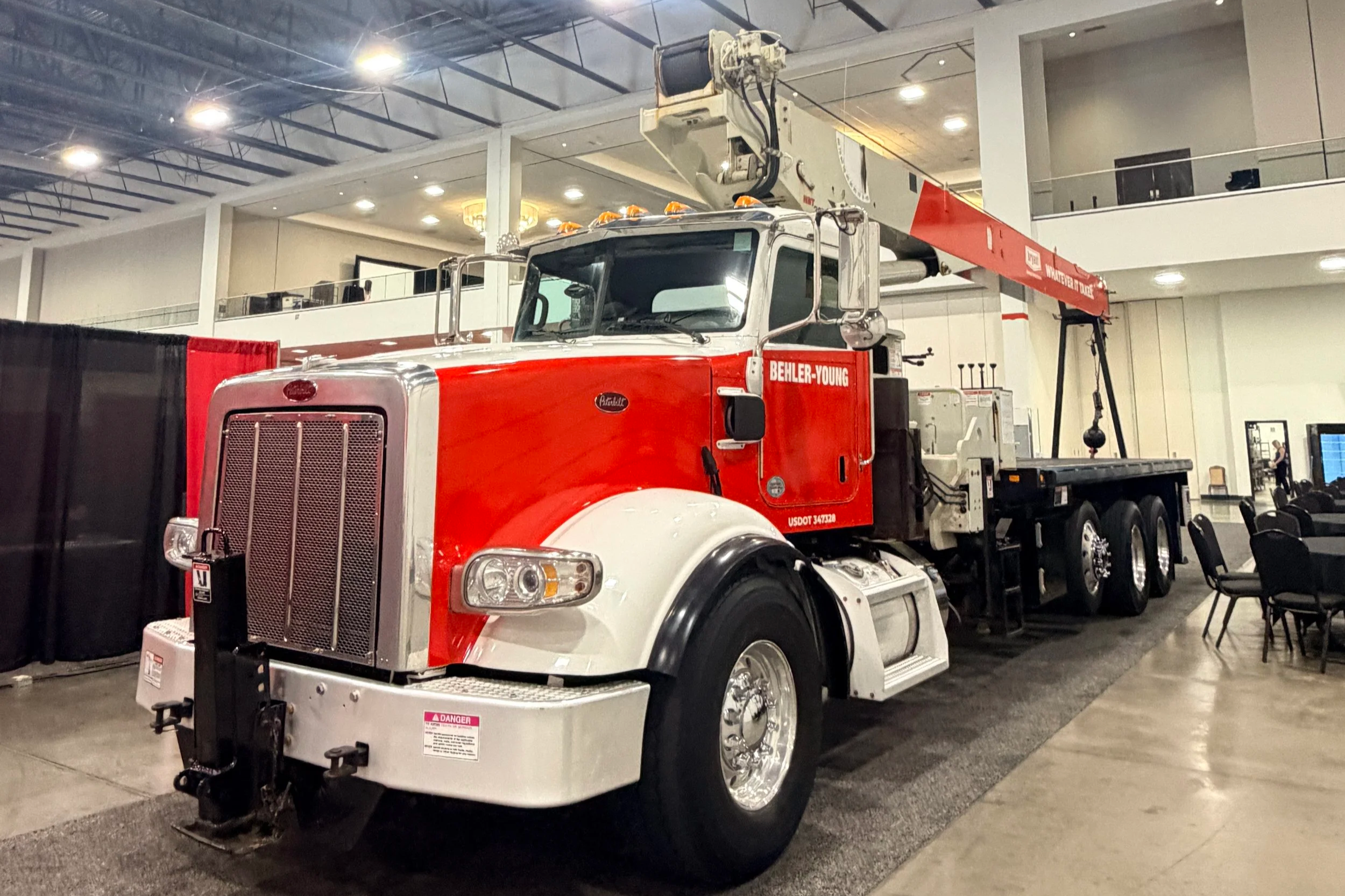 Red semi-truck detailed on site by LCB Auto Detailing