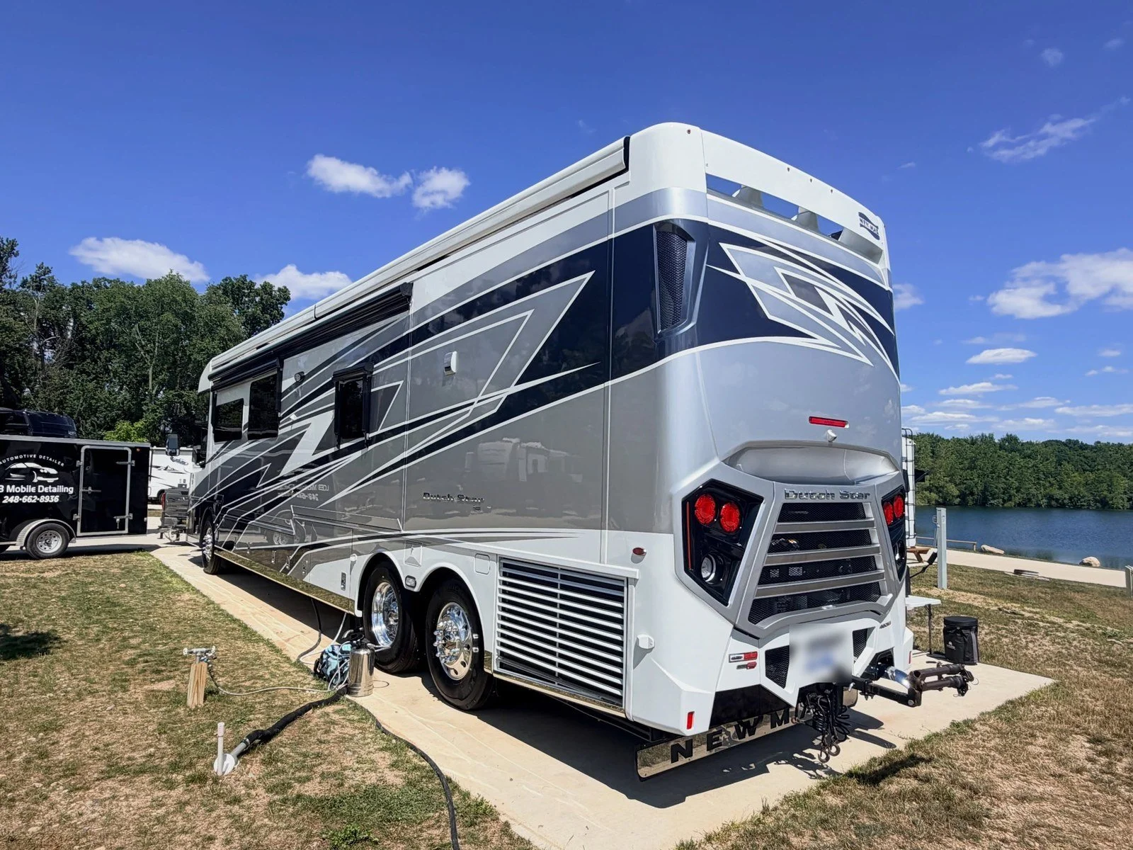 Silver Class A motorhome after a mobile RV exterior detail