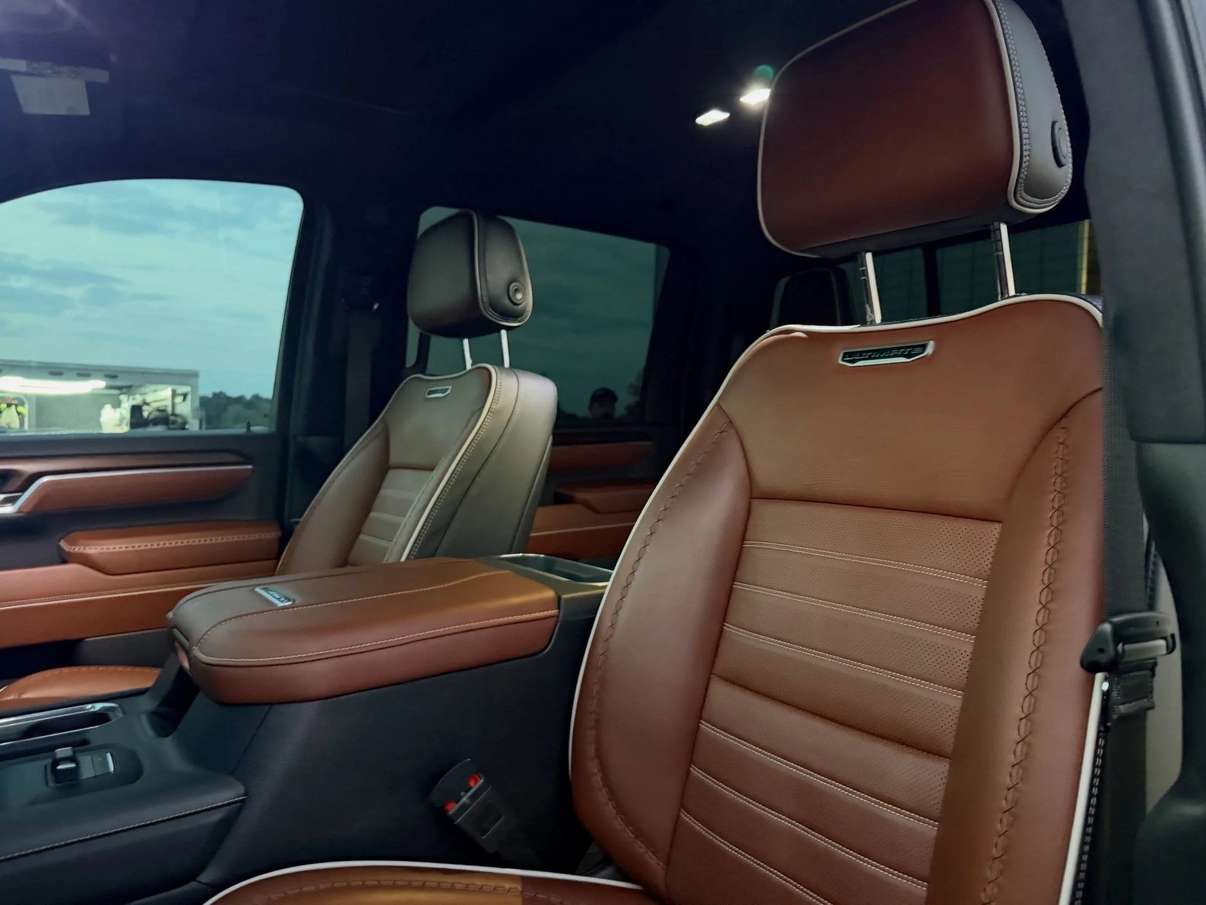 Brown leather truck seats and cabin after an interior detail