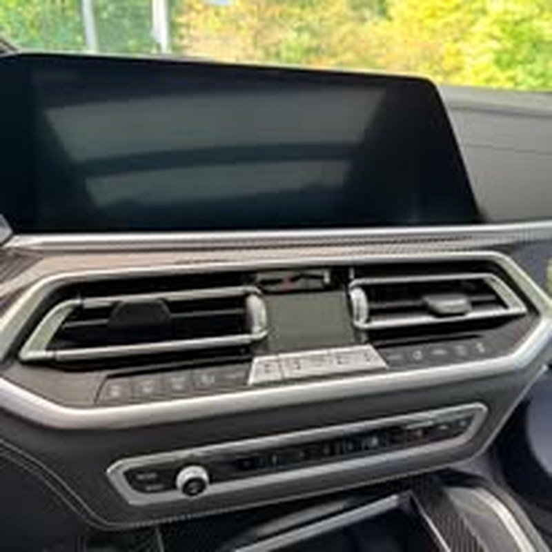 Clean center console and screen after an interior detail