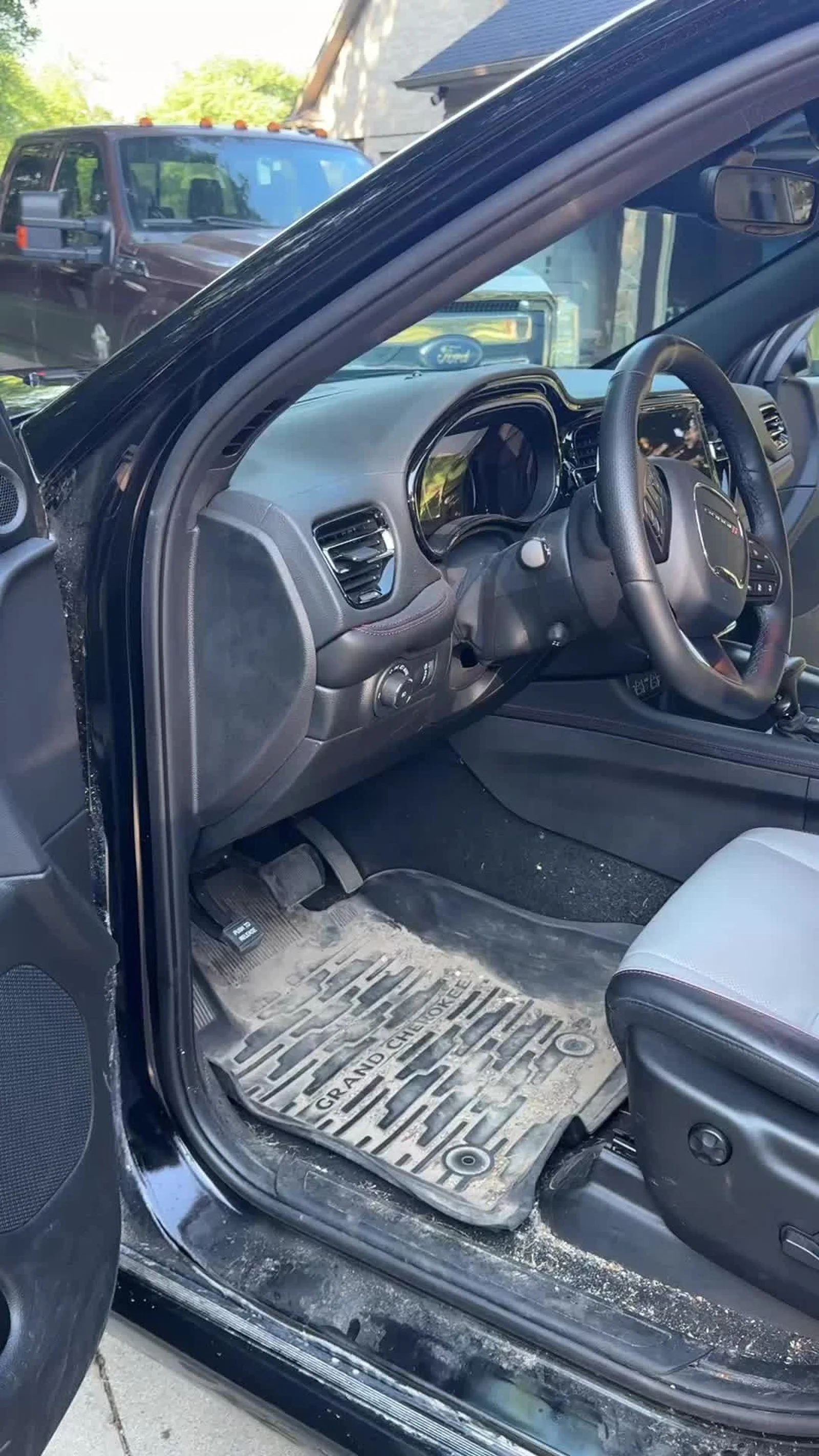 Driver footwell and door area after mobile interior detailing