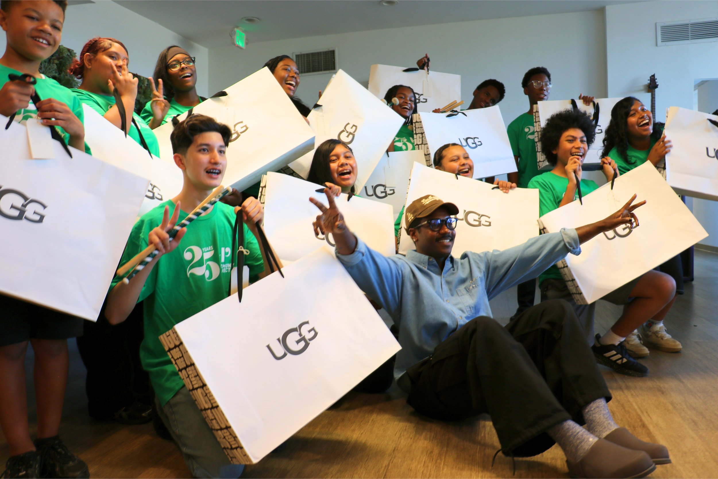 UGG and Channel Tres Surprise Harmony Project Drumline Students