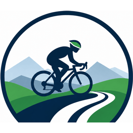 Un cycliste en pleine descente dans un paysage de montagnes avec une route serpentant.