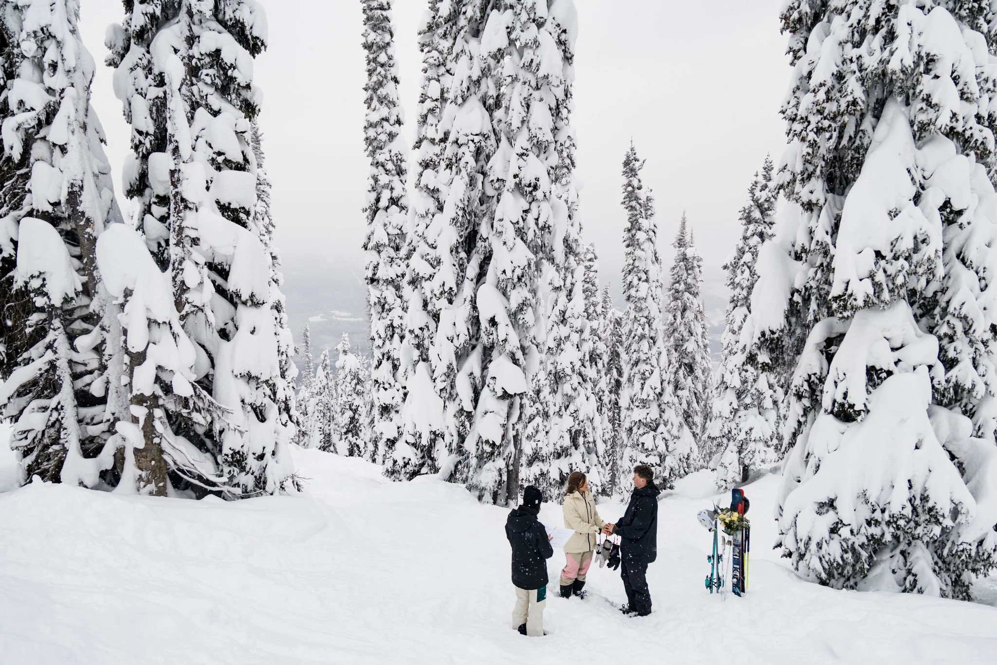 ski access elopement ceremony on a mountain in the winter