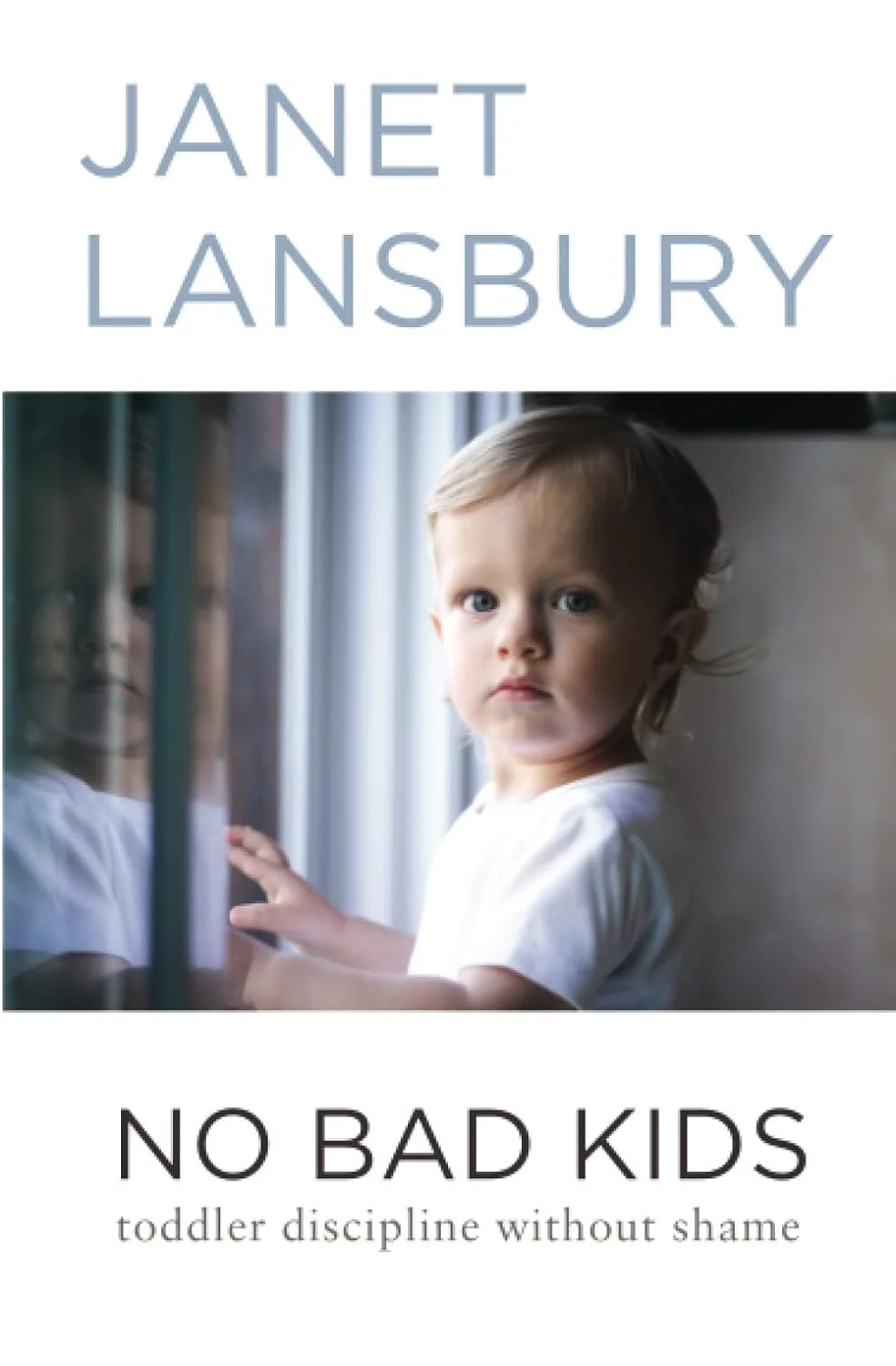 Book cover of 'No Bad Kids: Toddler Discipline Without Shame' by Janet Lansbury, featuring a photo of a toddler looking out a window.