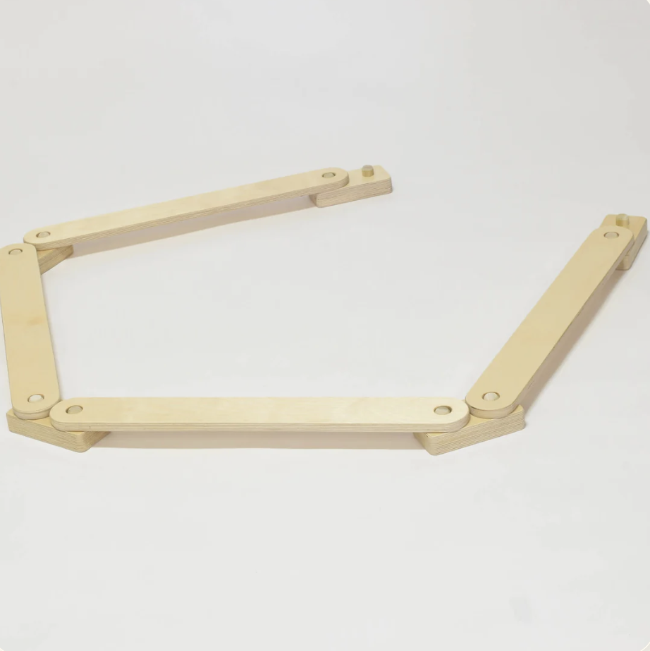Wooden adjustable armature on white background, manufactured by RAD children's furniture.