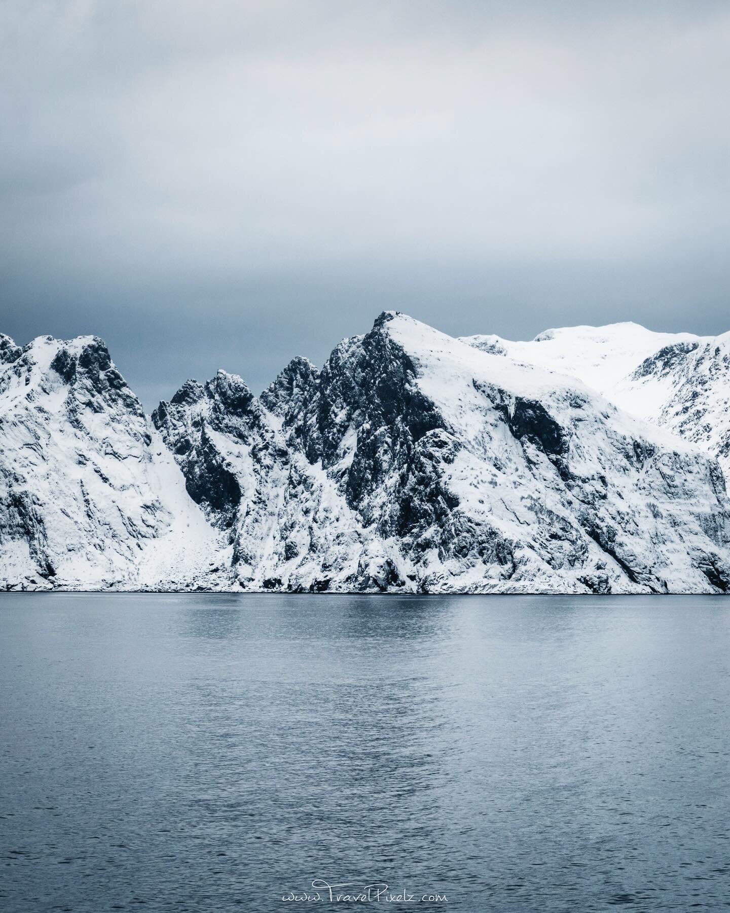 Swipe to see the full panorama. 
.
I was so captivated by the colours of Lofoten Islands in winter. The colour palette is beautiful, muted and minimalist, basically monochromatic. There&rsquo;s white and black of course, and then some grays as well a