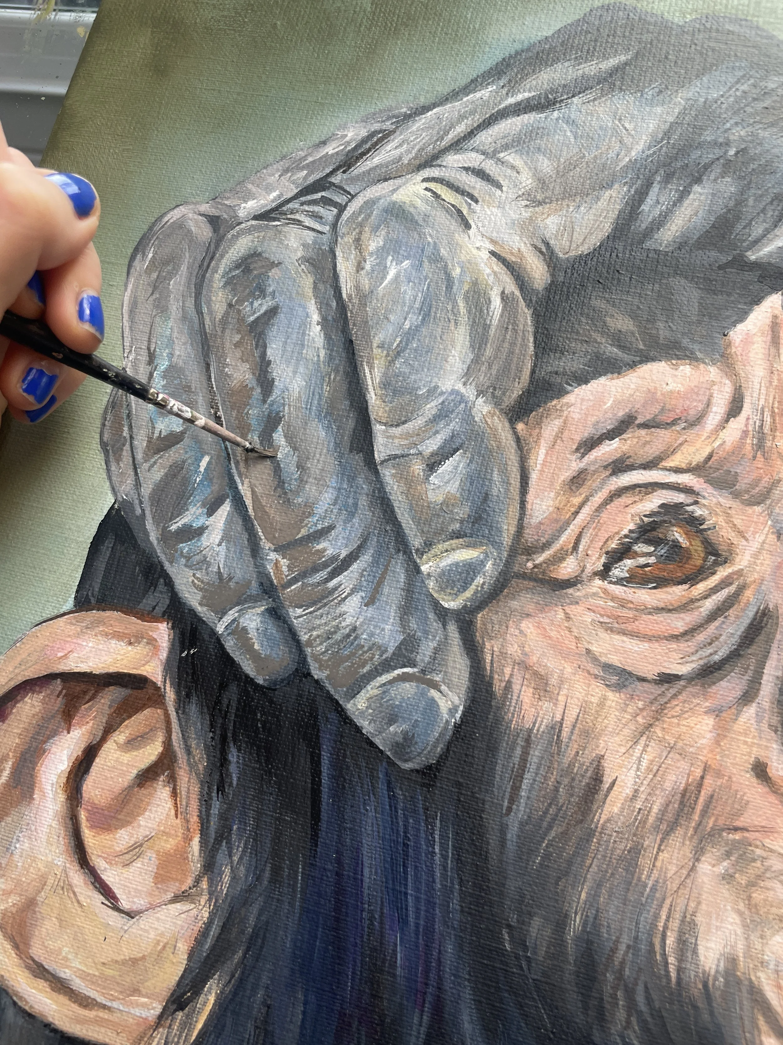 up-close shot of a chimp painting