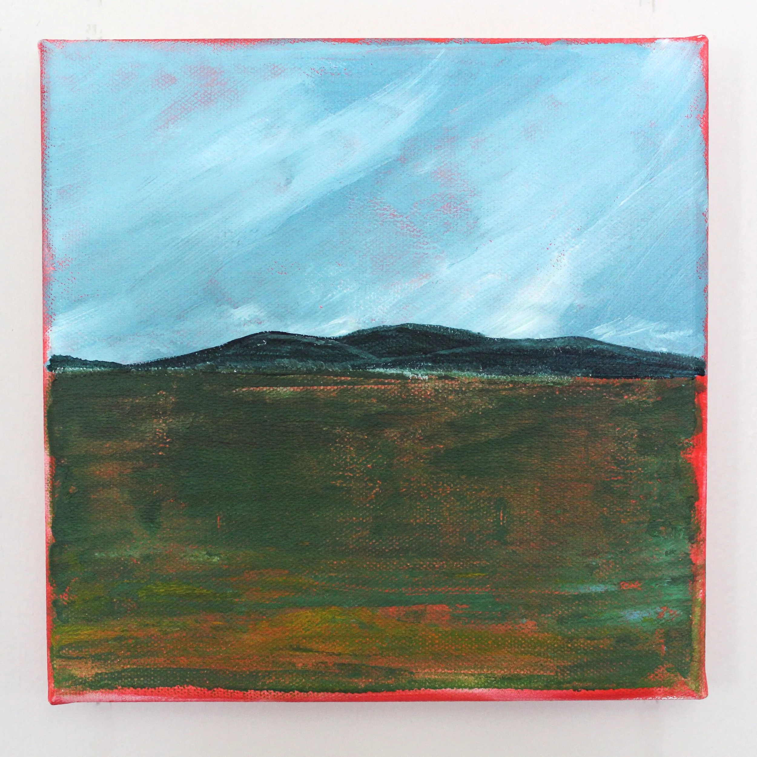 An abstract landscape painting with a blue sky with white streaks, dark rolling hills, and a textured green and brown field underneath, framed with a red border.