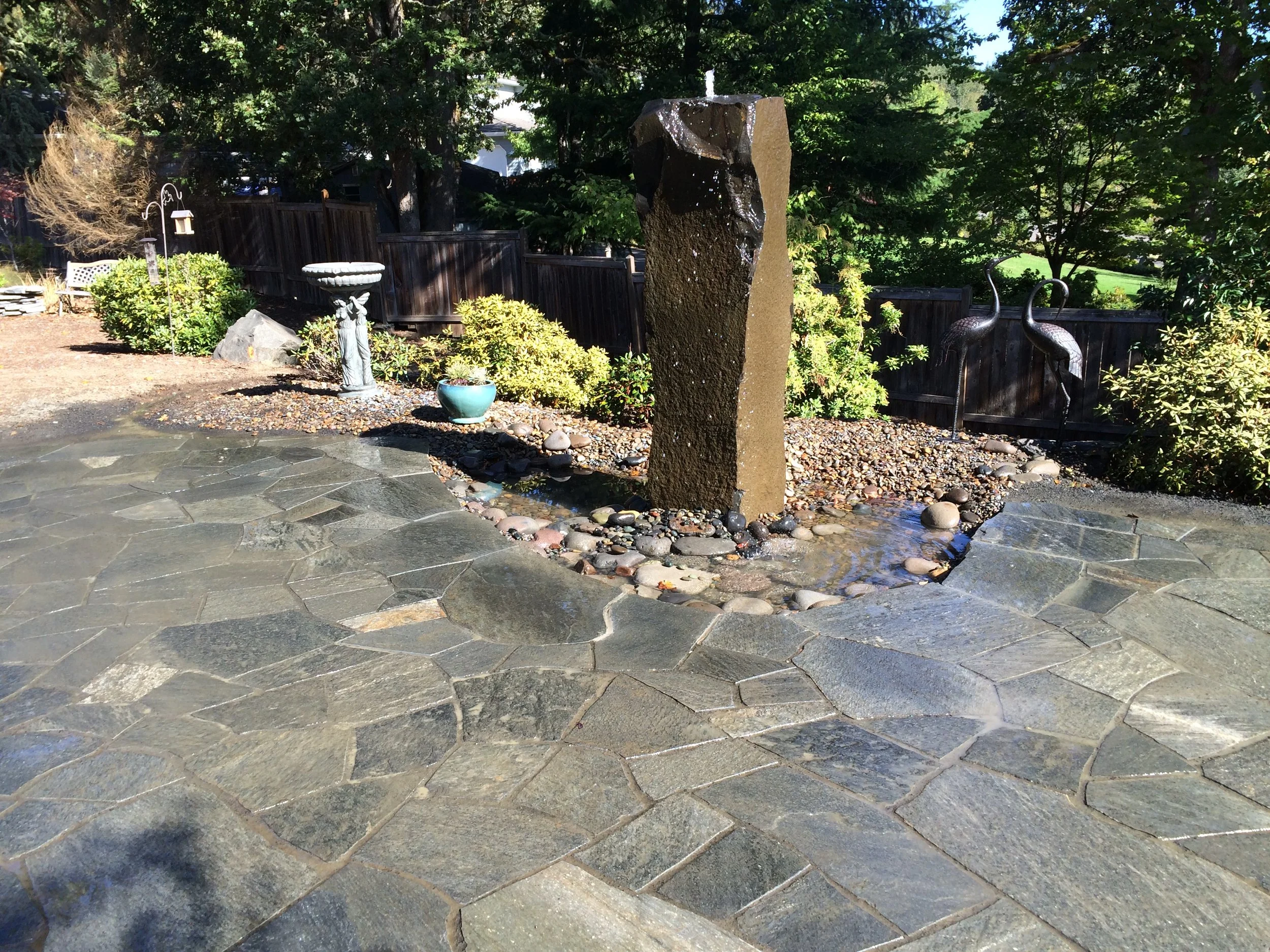 flagstone patio with fountain