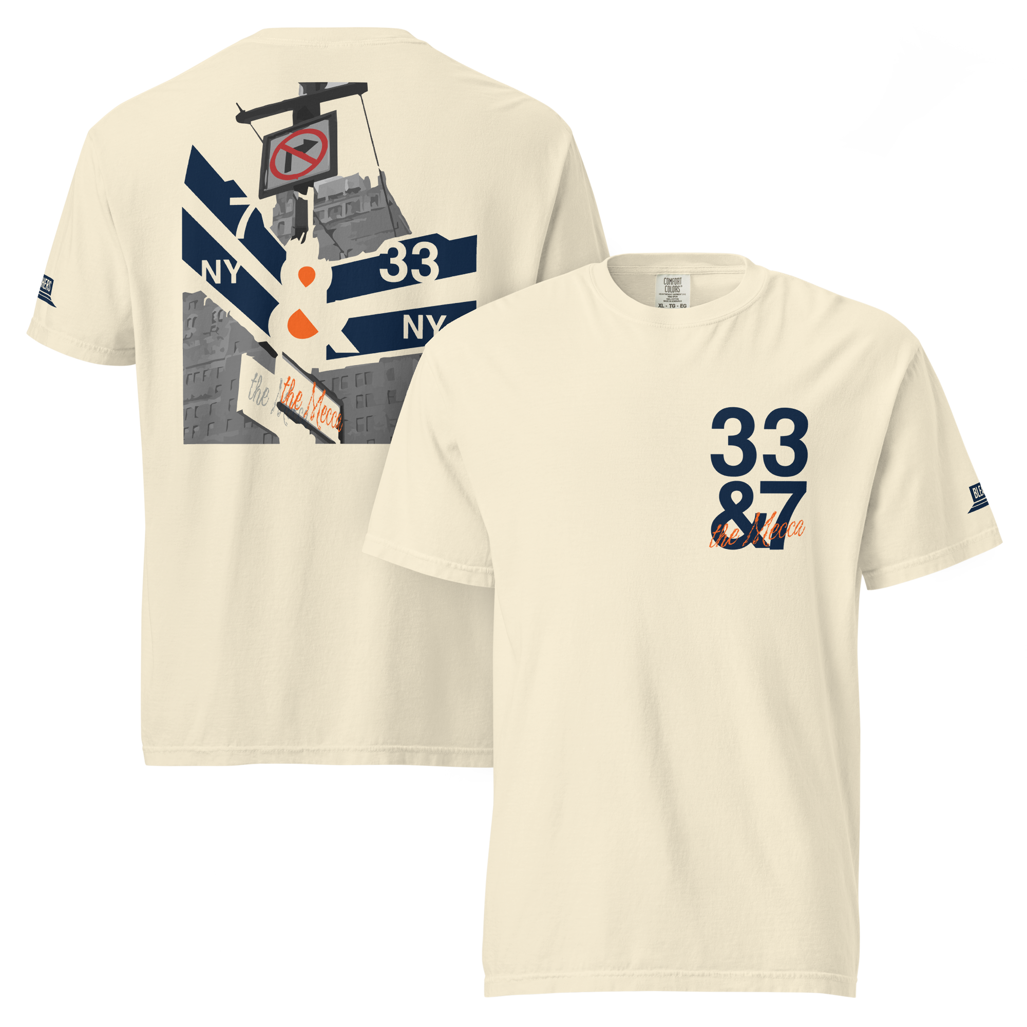 Cream Comfort Colors t-shirt shown front and back. Front has a small "33 & 7 the Mecca" chest print. Back has a large NYC street sign graphic in navy and orange.