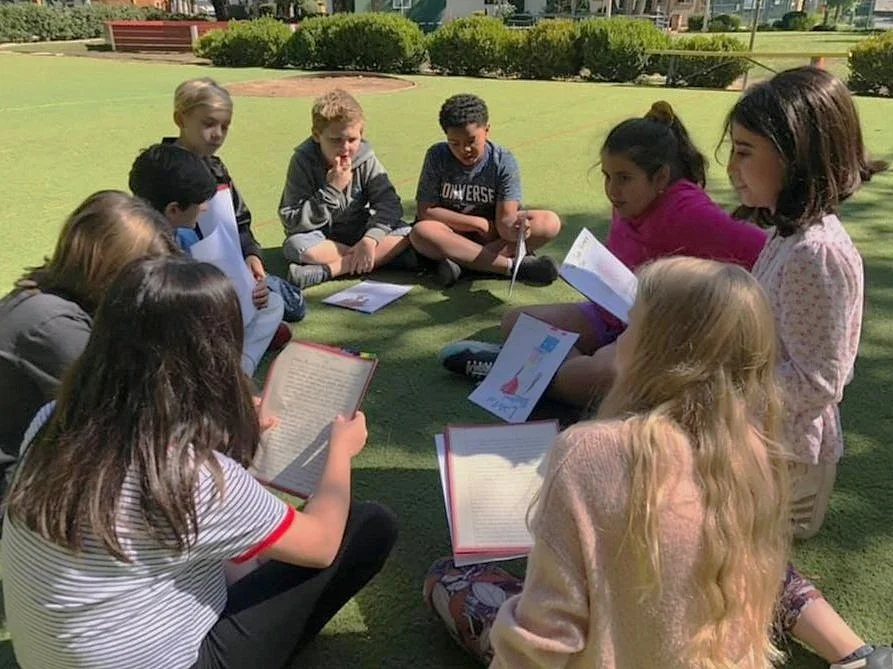 WHPS students learning together outdoors