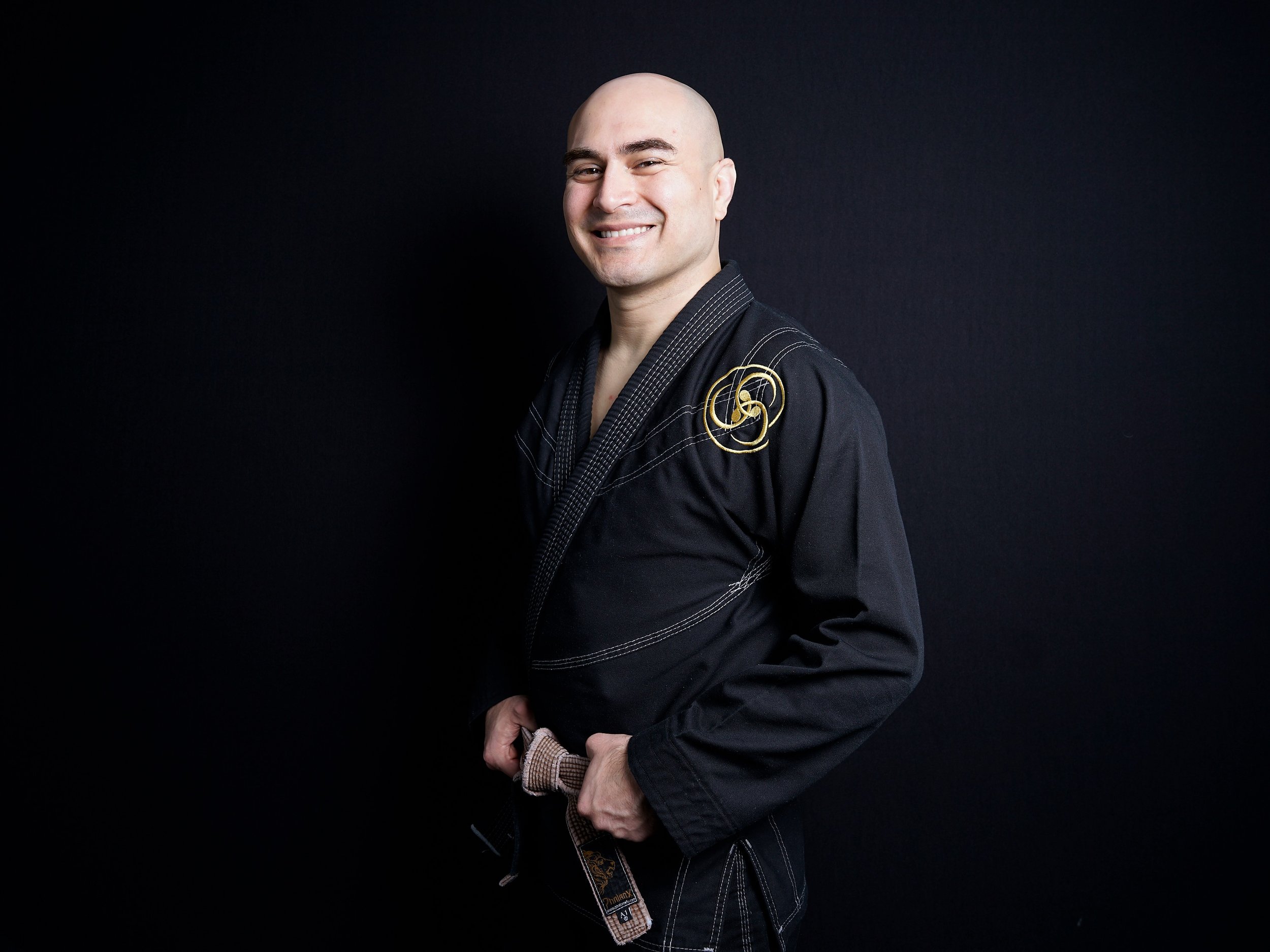 Cesar Brown Belt Smiling Standing.jpeg