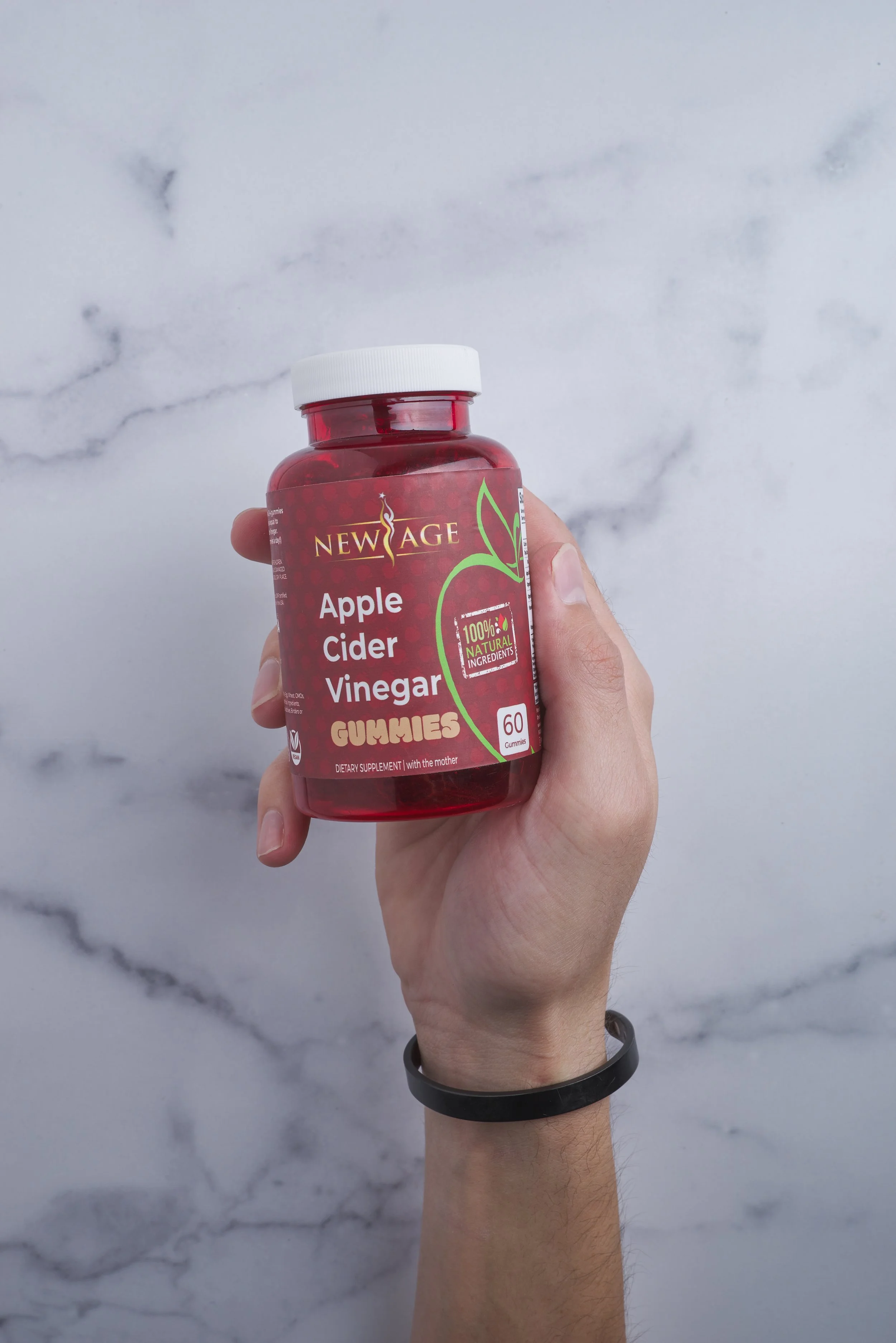 08032020-Apple Cider Vinegar Gummies Bottle with Male Hand-07312020-Lifestyle and Produce3238.jpg
